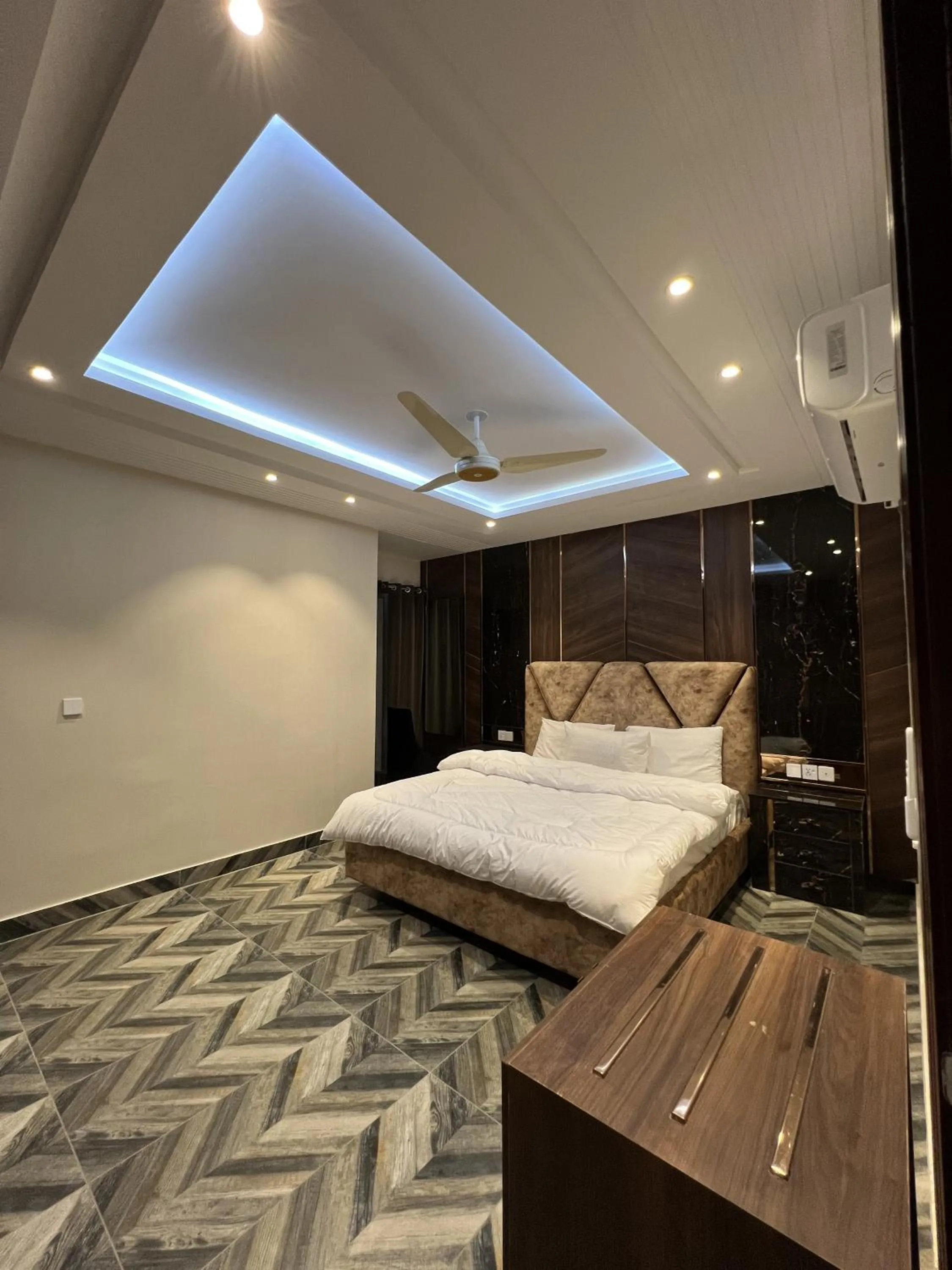 Bed in Courteous Hotel