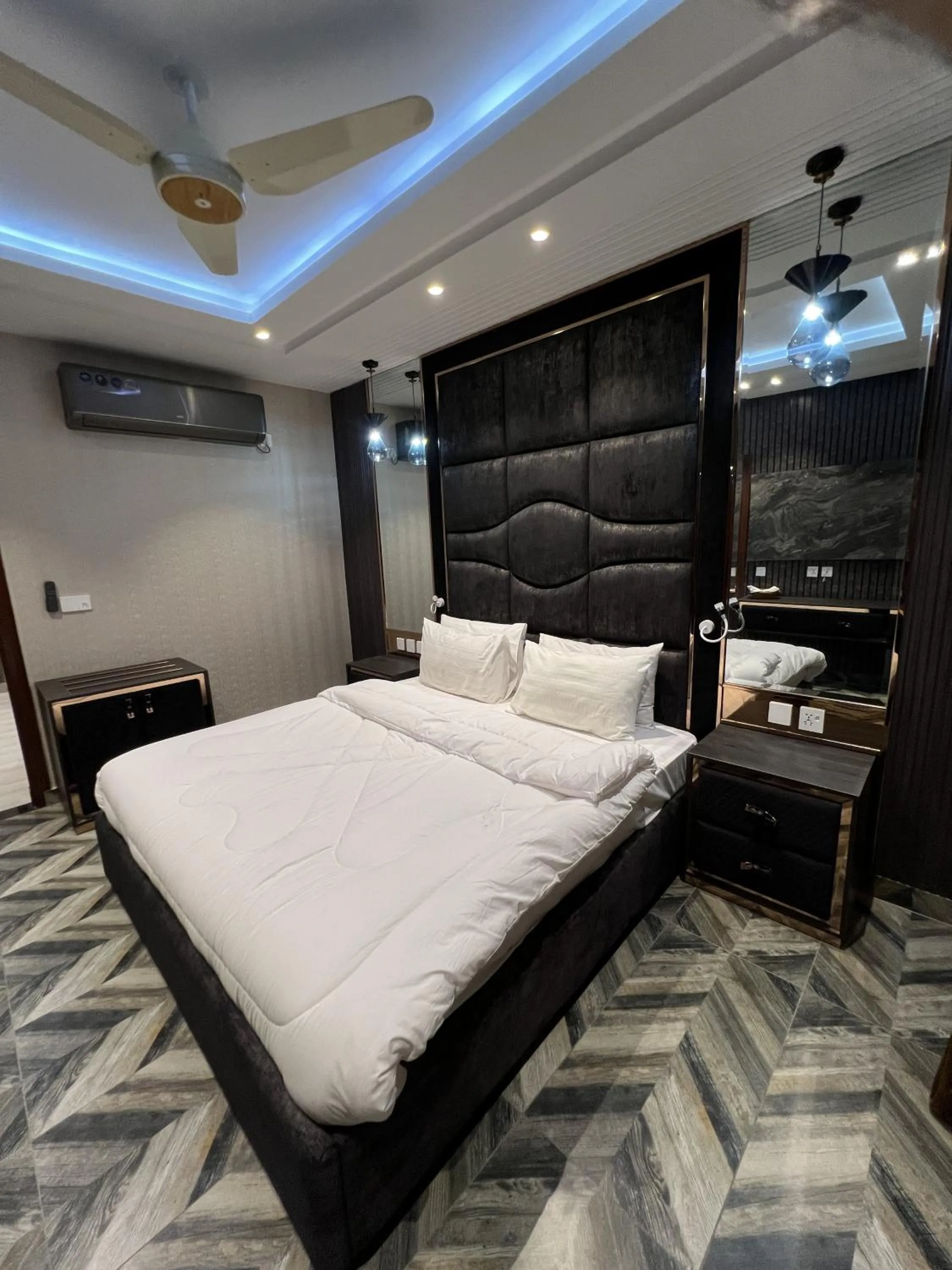 Bed in Courteous Hotel