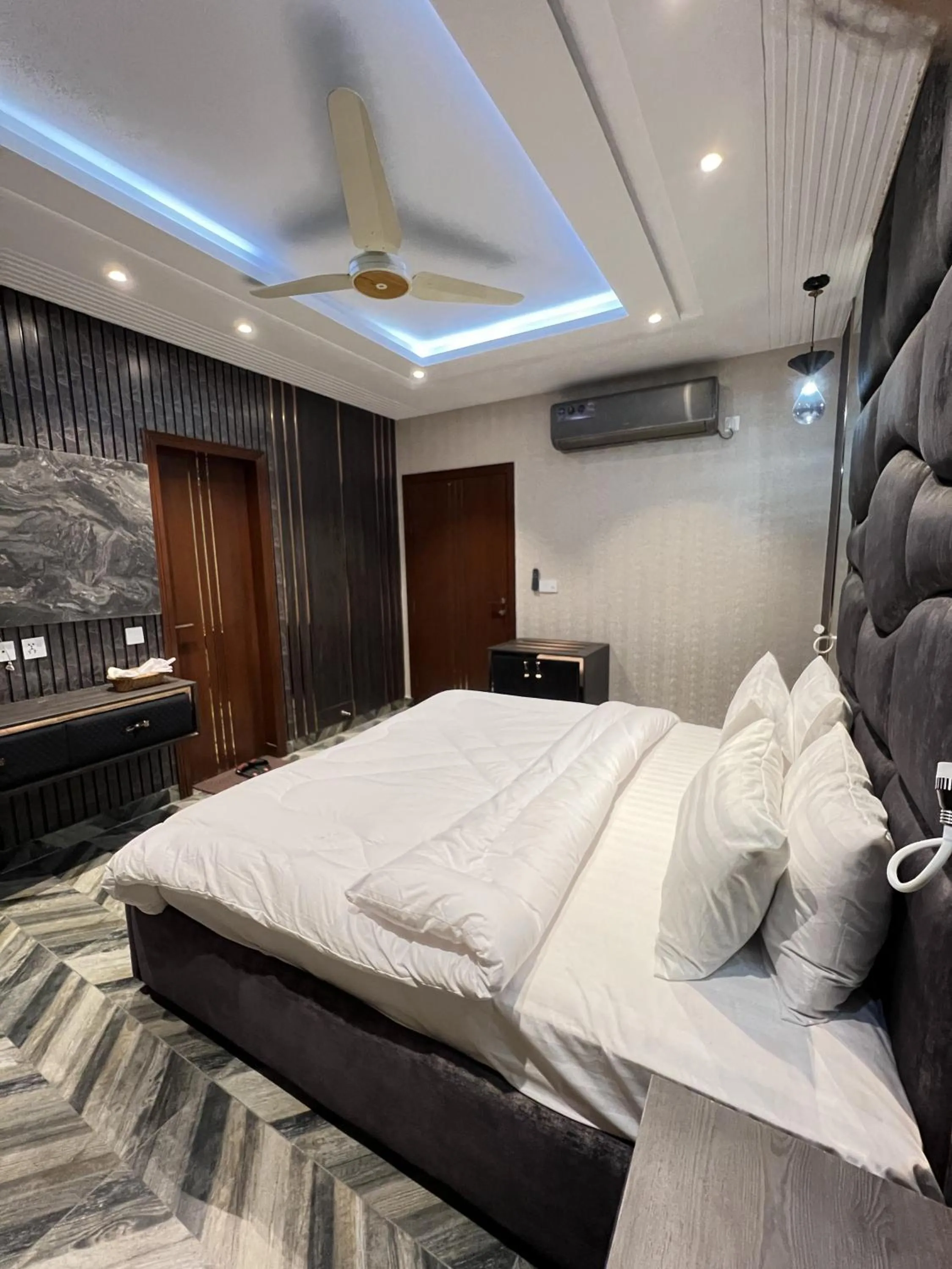 Bed in Courteous Hotel