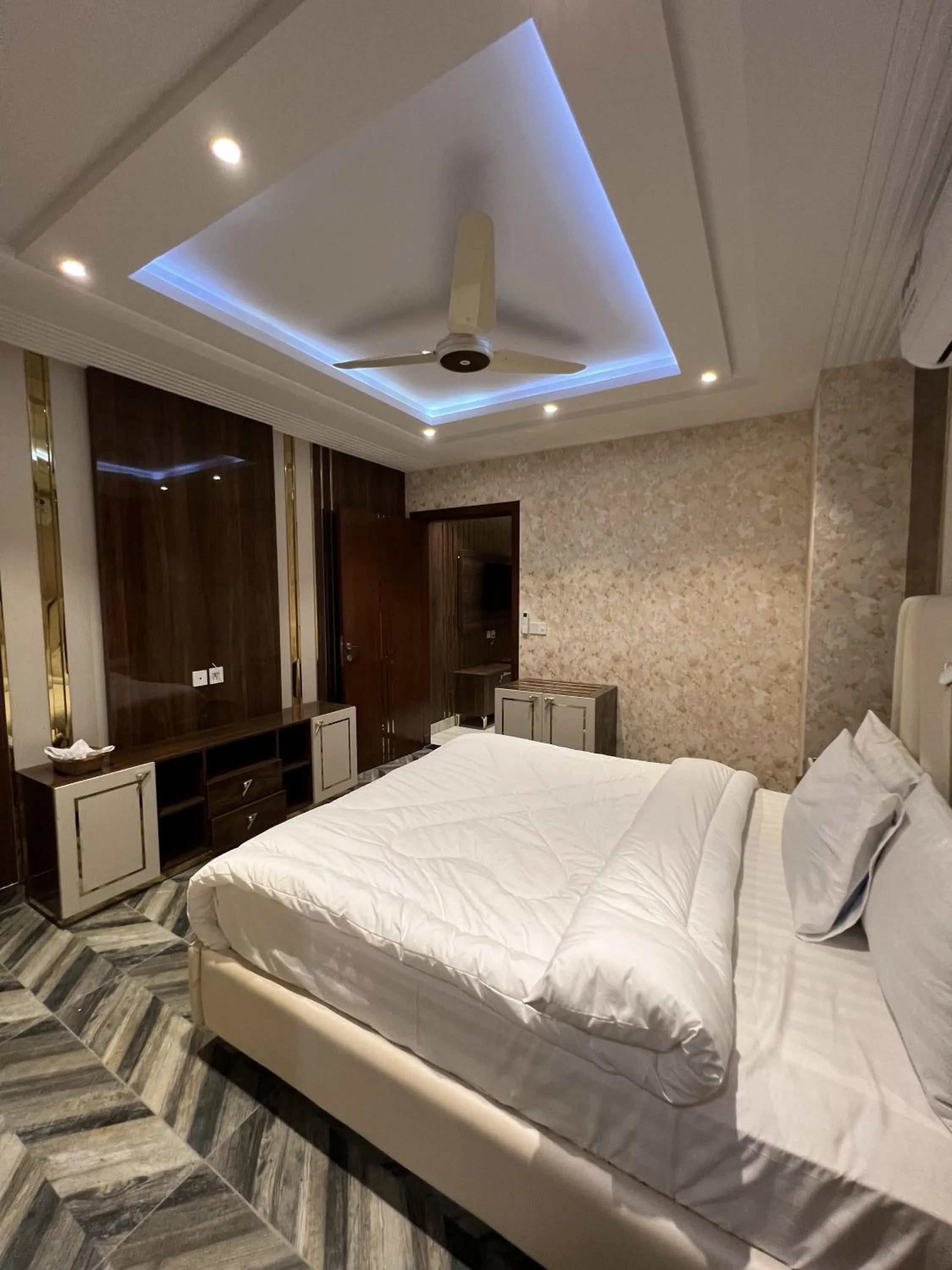 Bed in Courteous Hotel