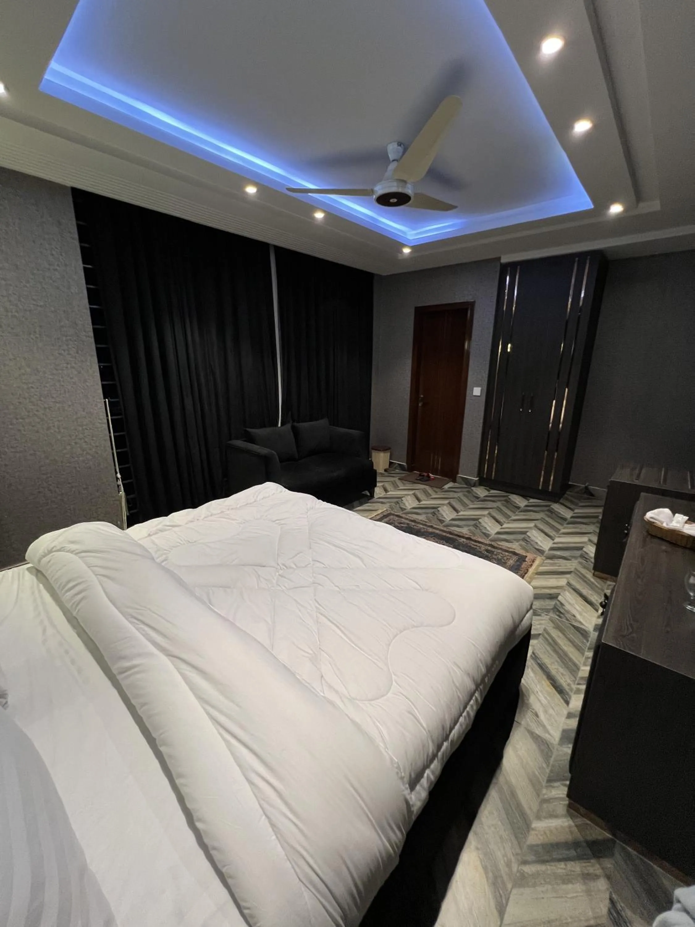 Bed in Courteous Hotel