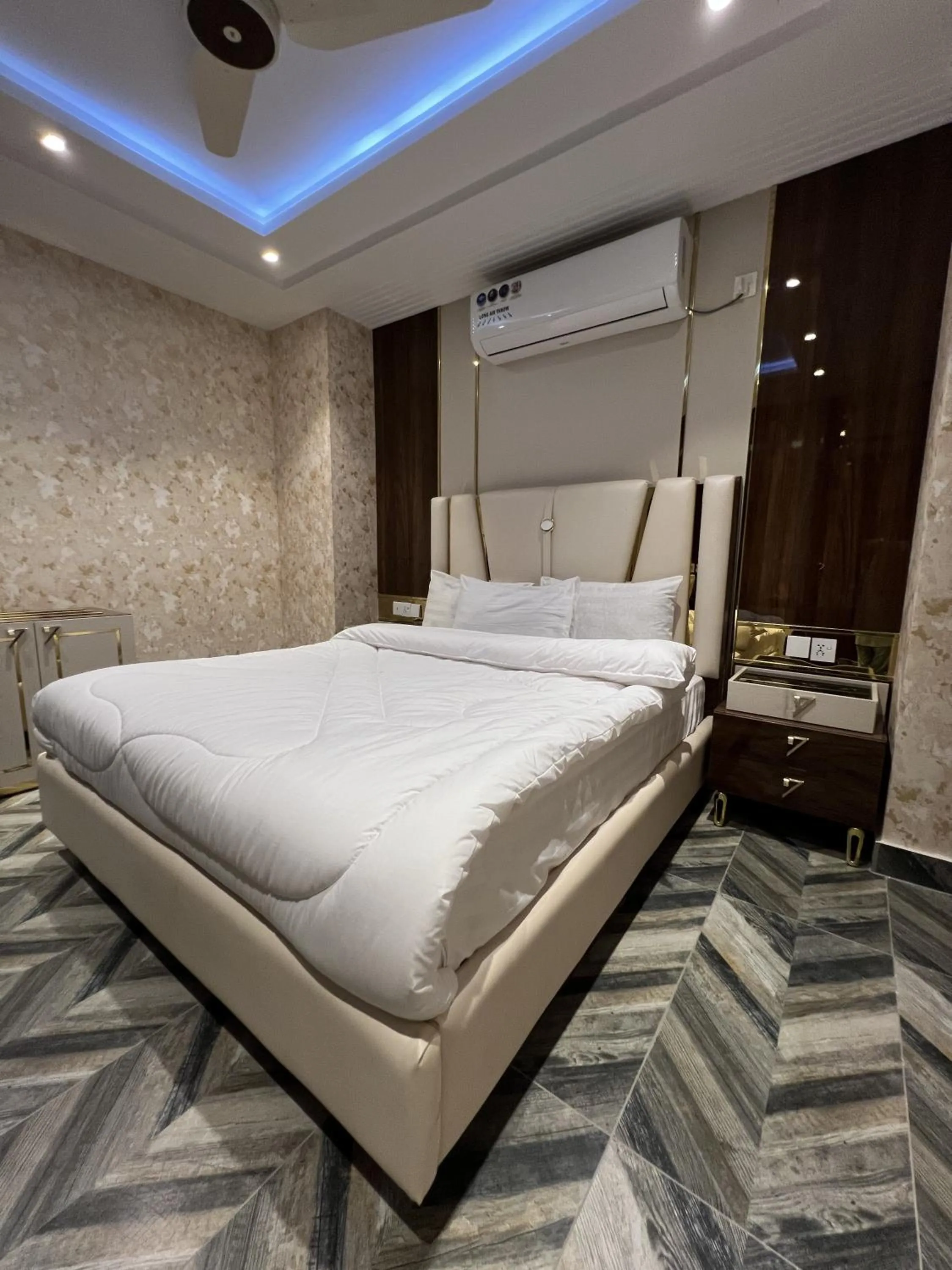 Bed in Courteous Hotel