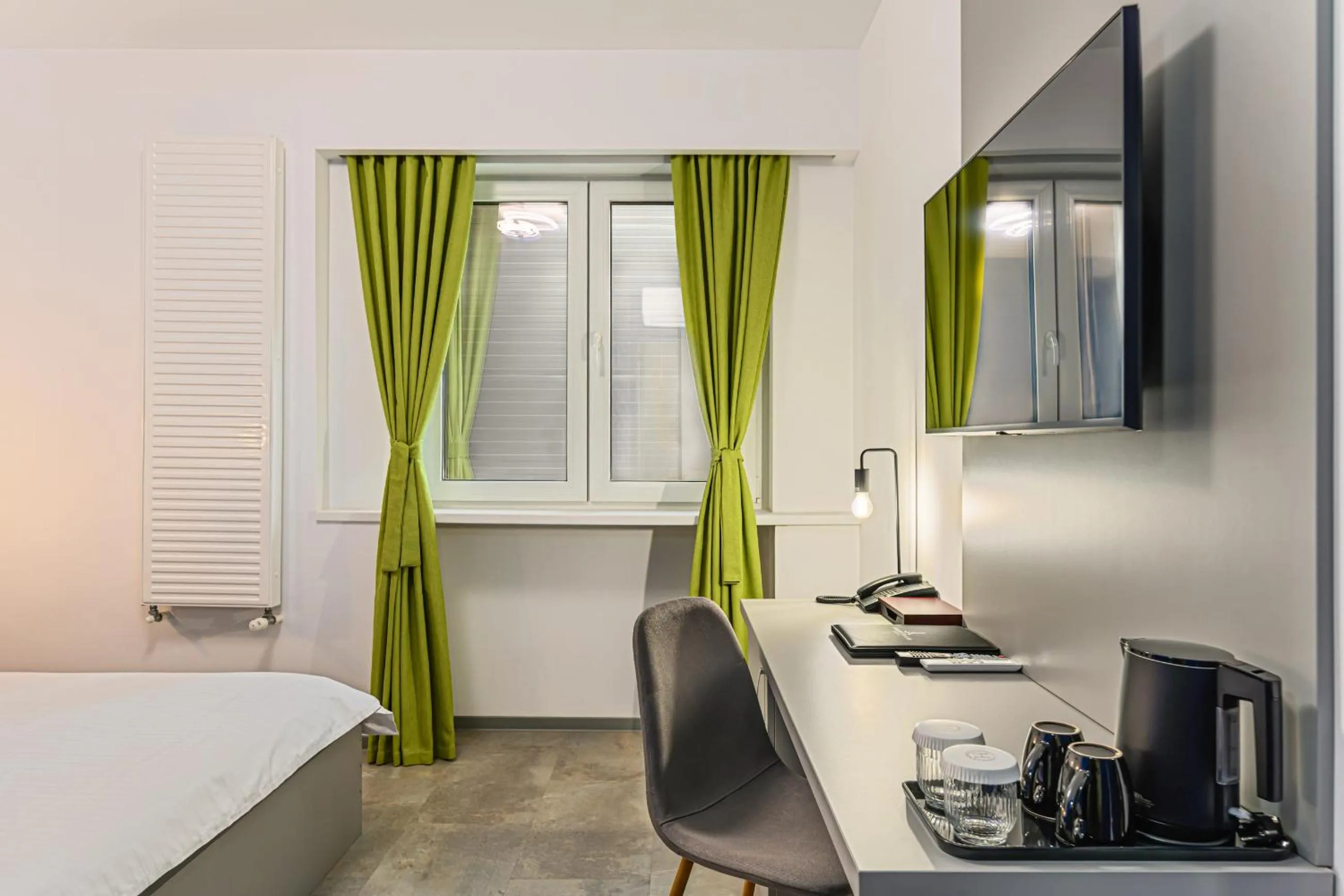 Bed in Johann Strauss Hotel