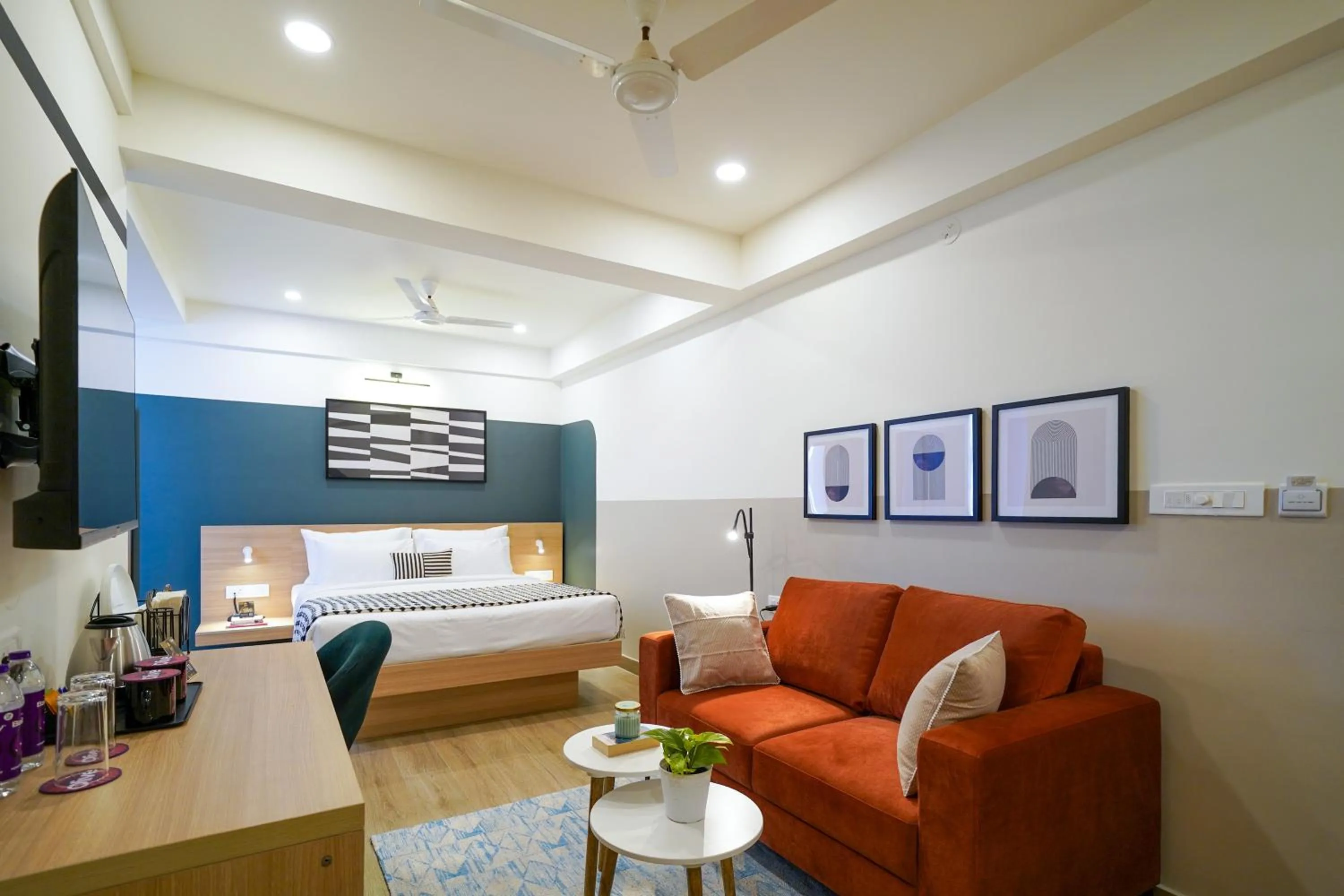 Seating area in Olive Hotel Hoodi by Embassy Group