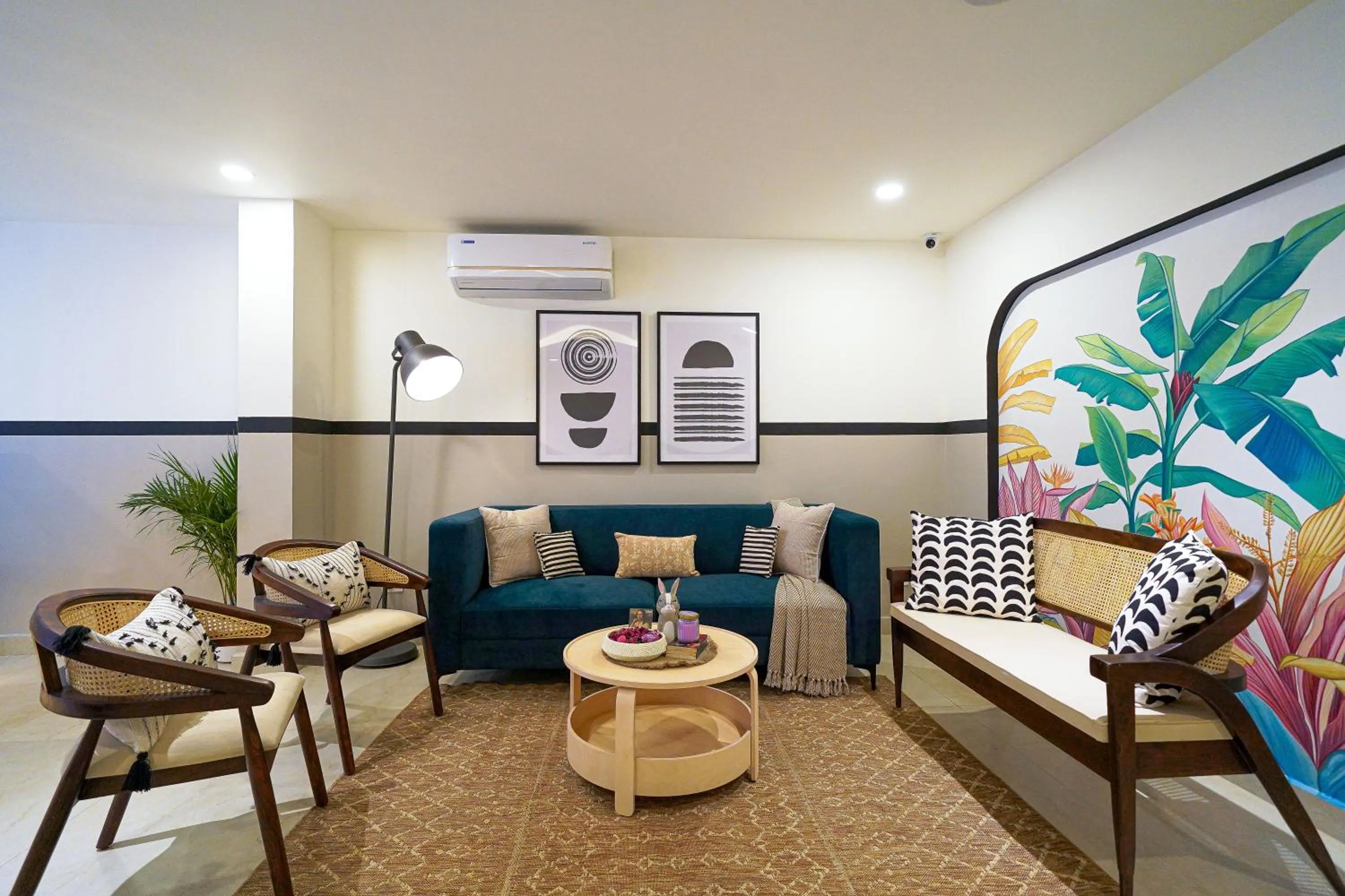 Seating area in Olive Hotel Hoodi by Embassy Group