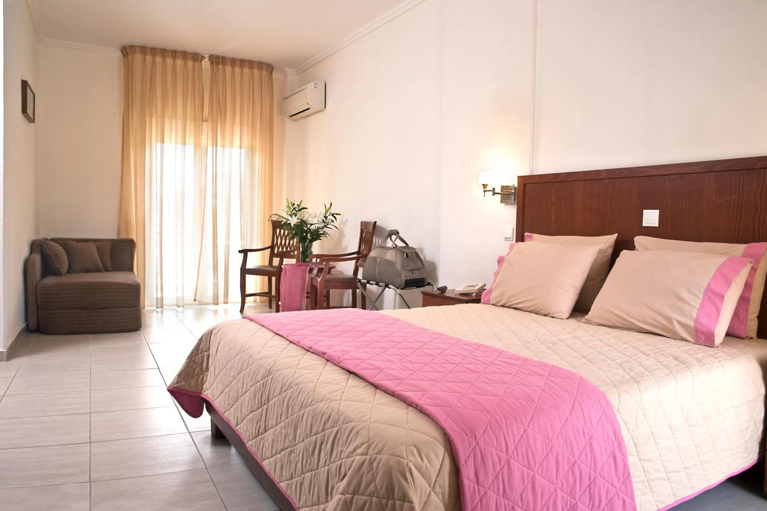 Bed in Stratos Hotel