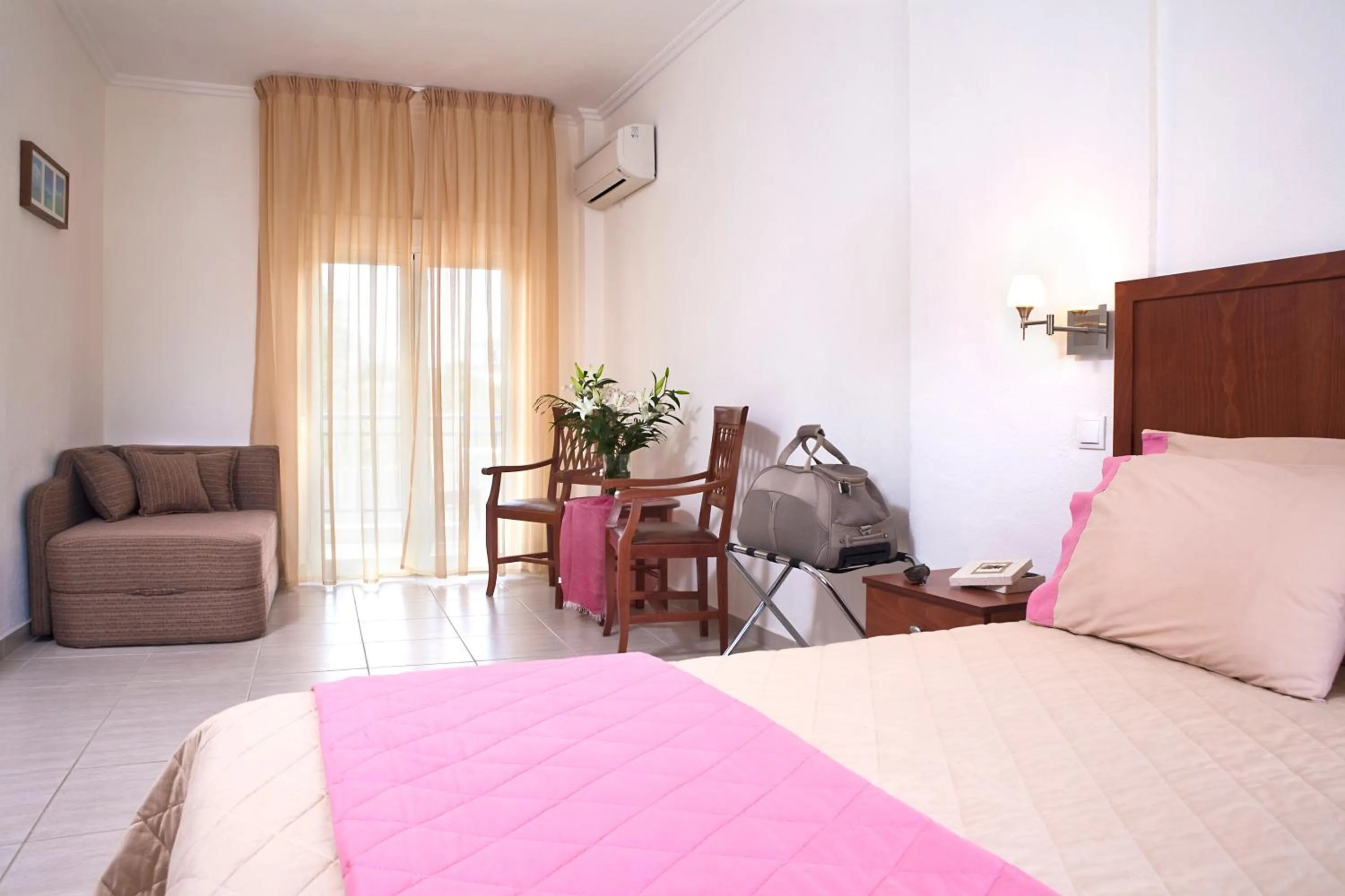 Bed in Stratos Hotel