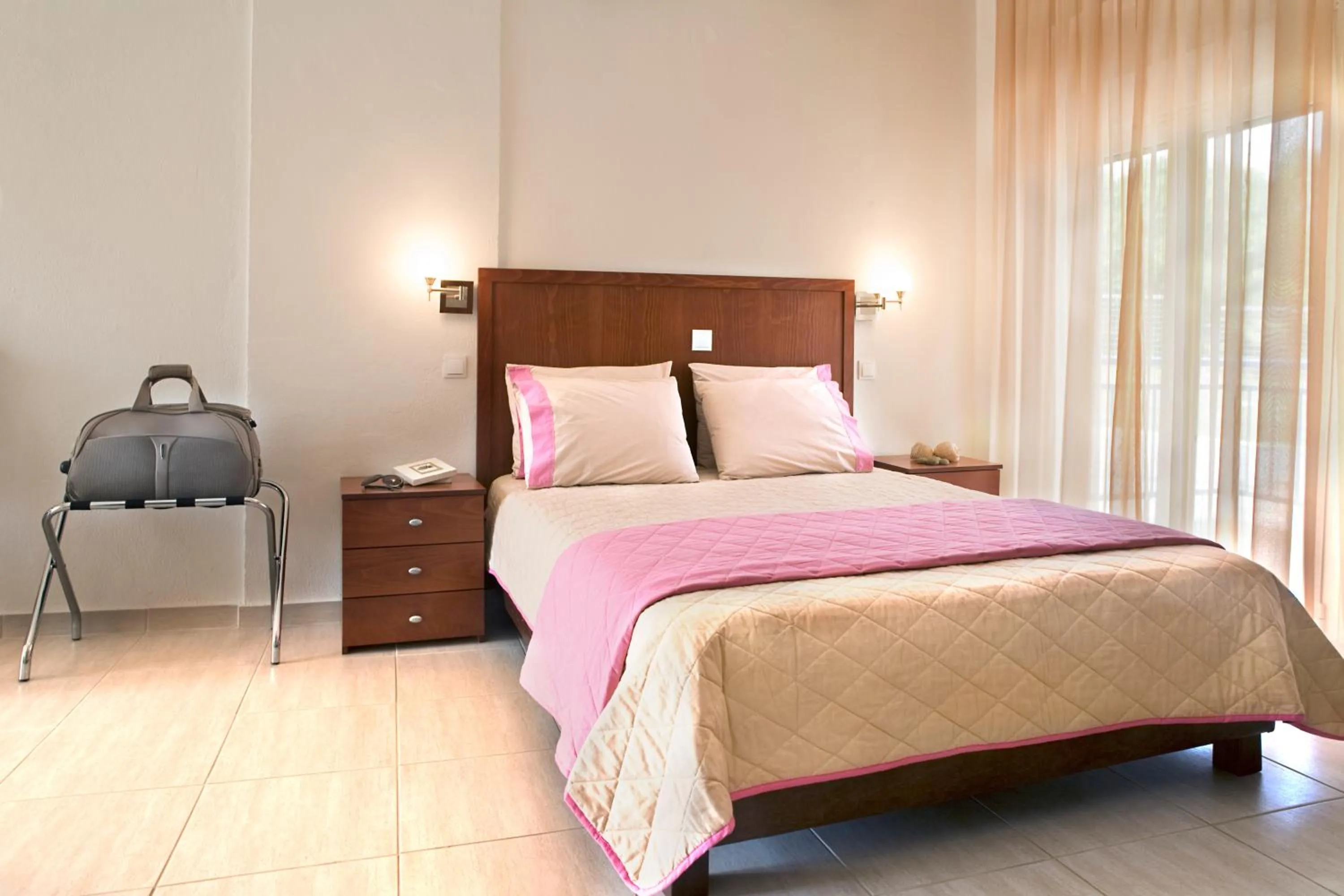 Bed in Stratos Hotel