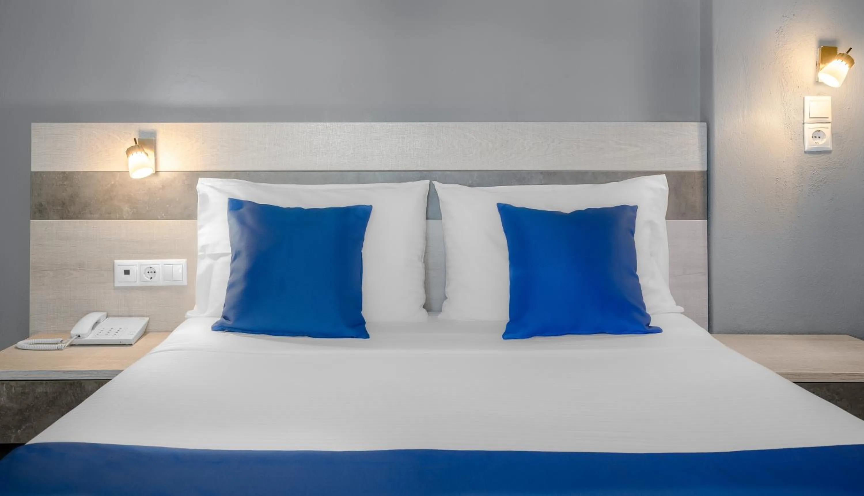 Bed in Stratos Hotel