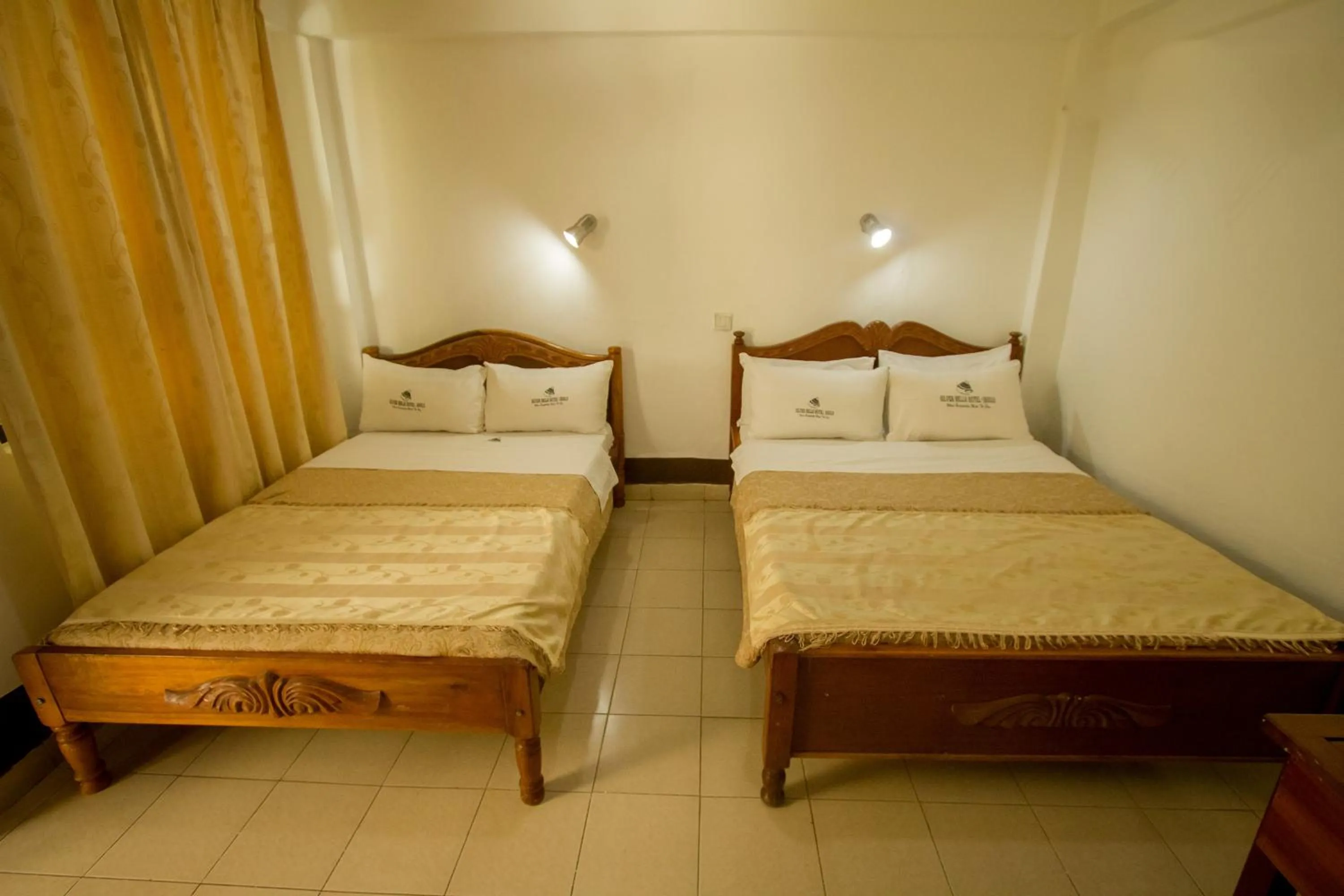 Bed in Silver Bells Hotel