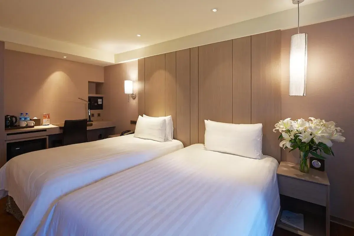 Bed in La Maison Hotel Bed in La Maison Hotel