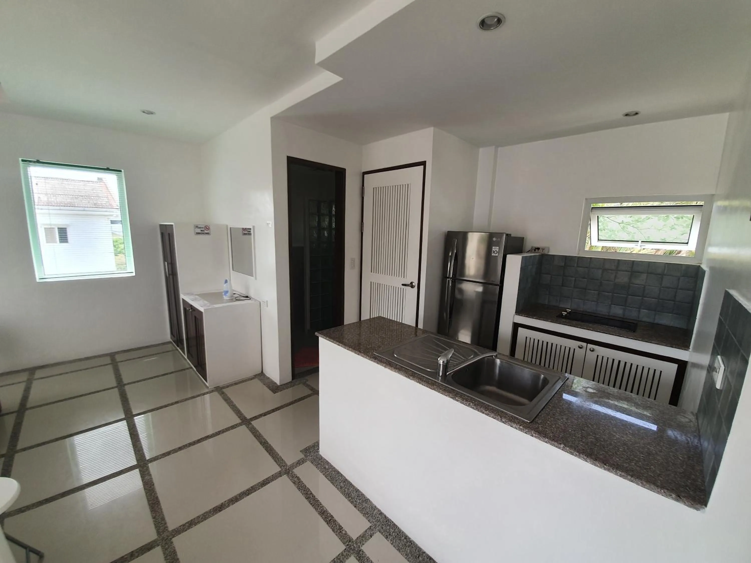 Kitchen or kitchenette in ClubBoracay Apartelle