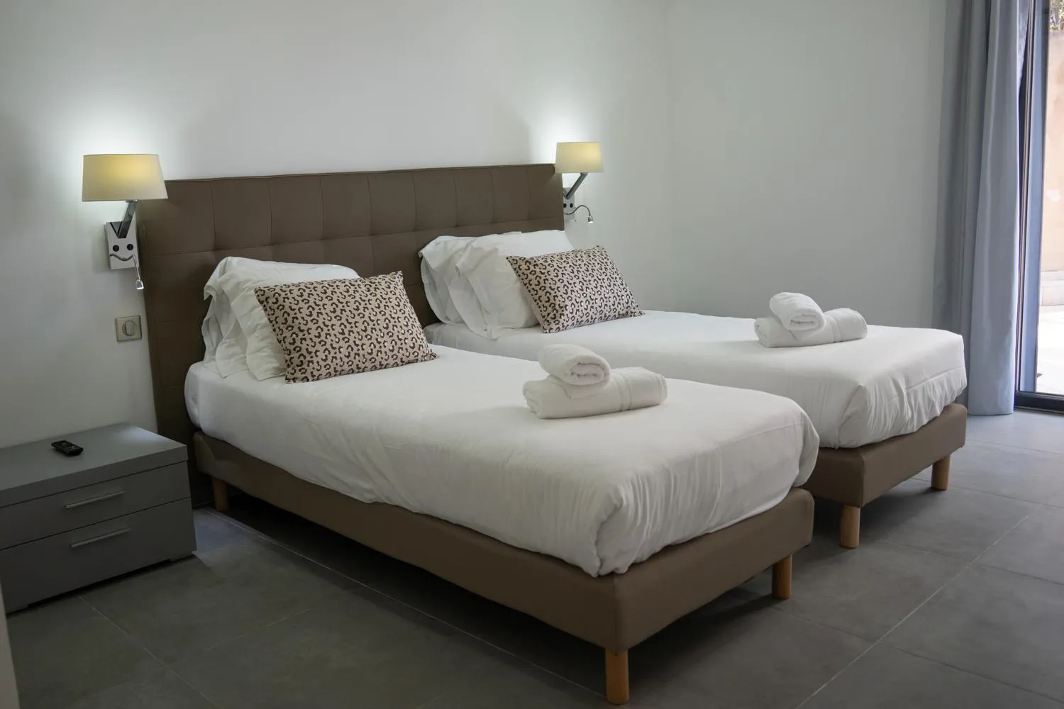 Bed in Résidence & Hotel U Livanti ECOLABEL