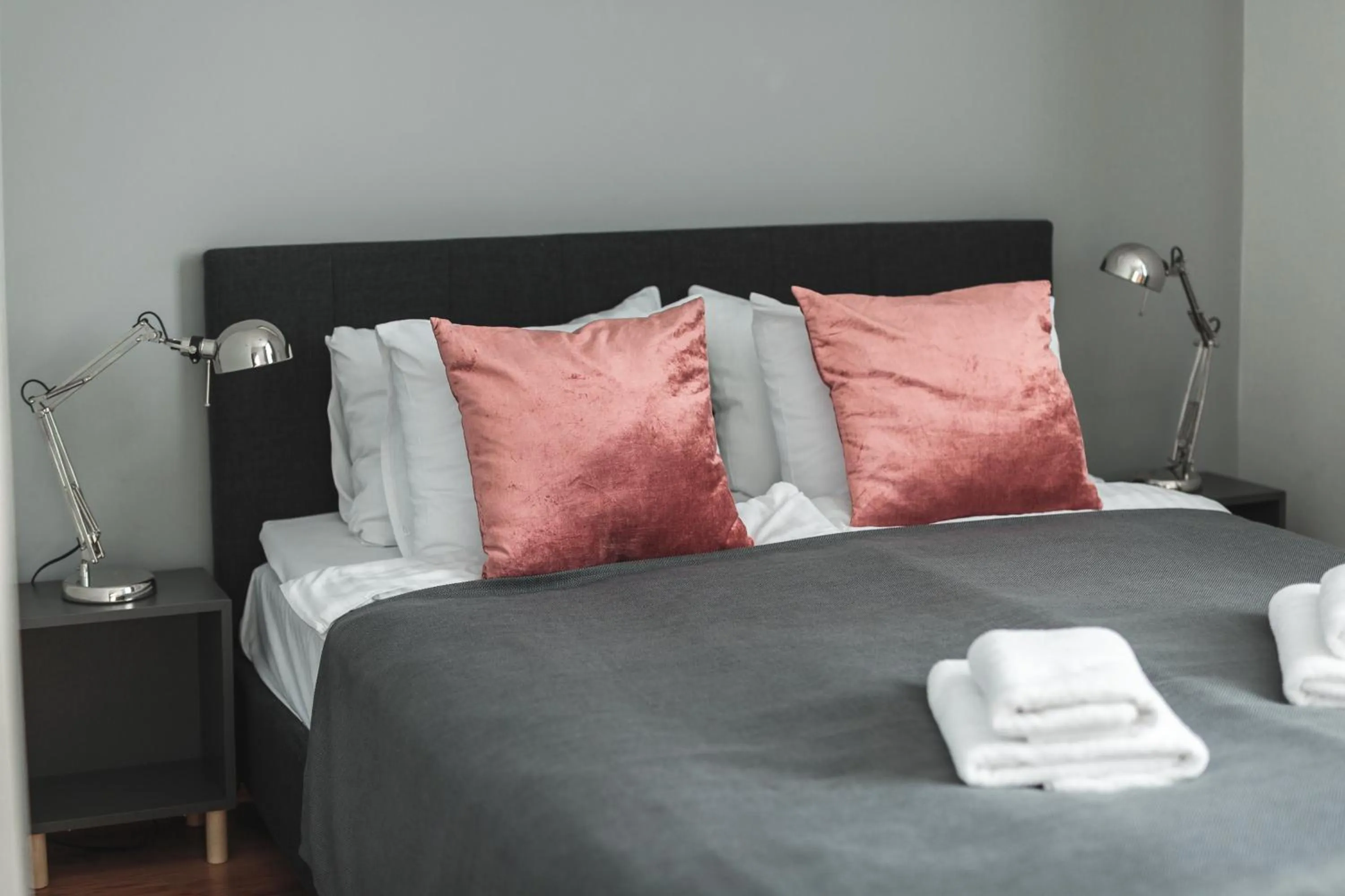 Bed in Bearsleys Downtown Apartments