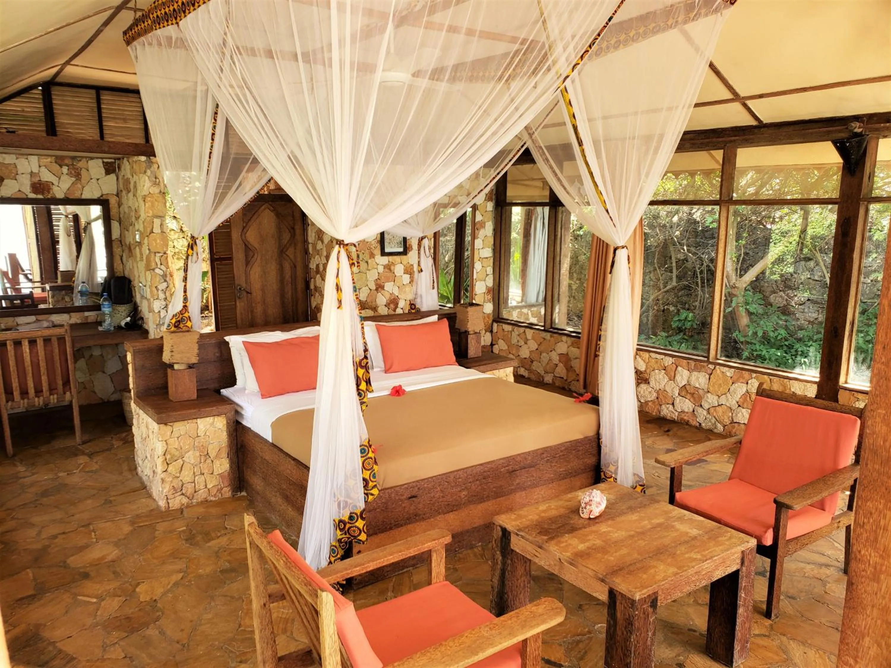 Living room, Bed in Seasons Lodge Zanzibar