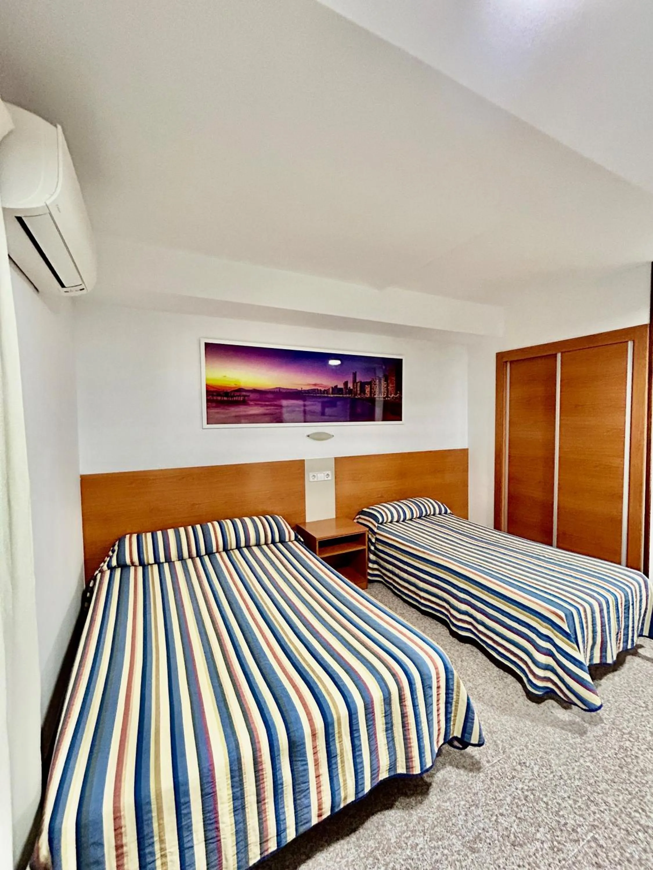 Bed in Pensión La Orozca Benidorm