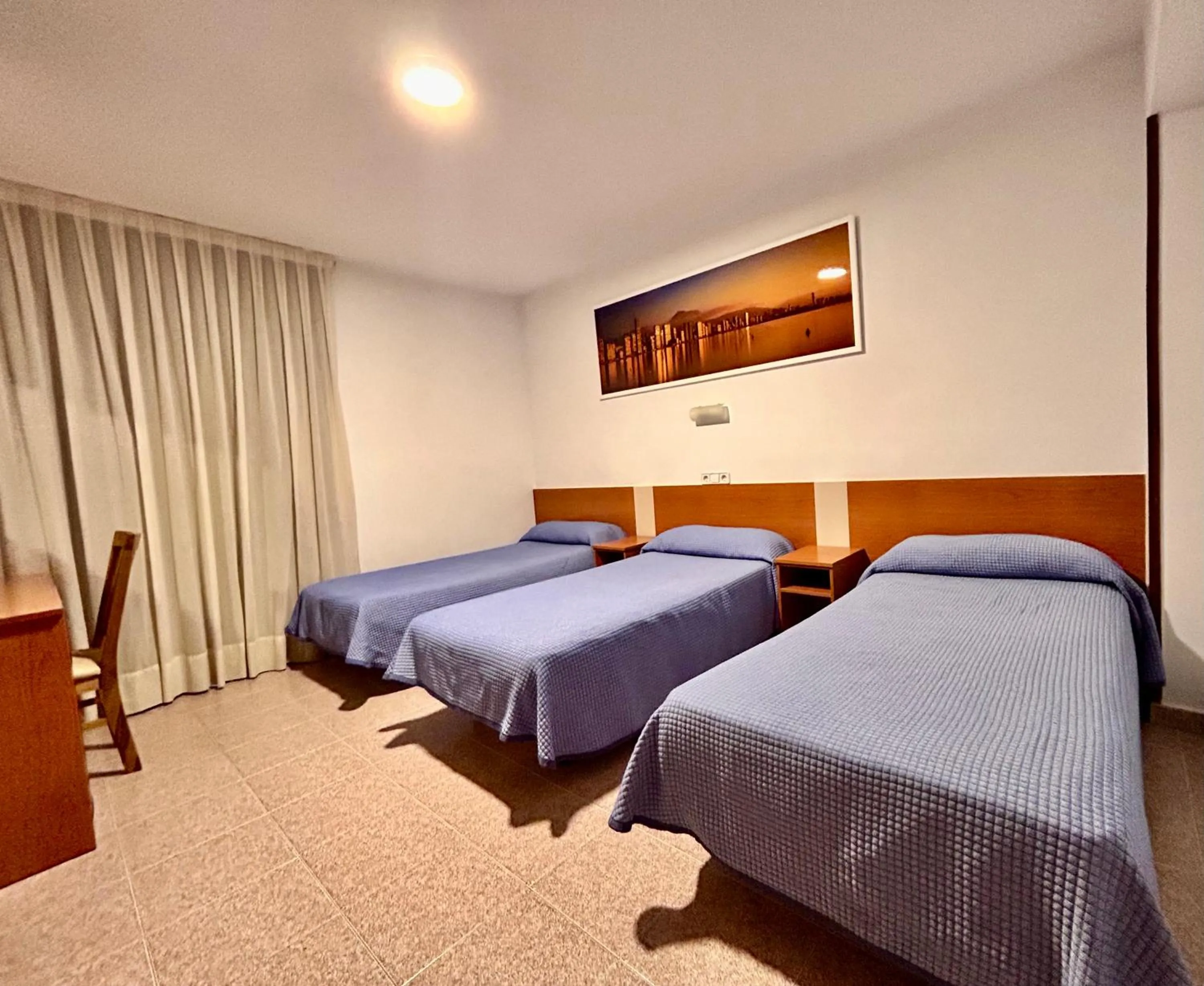 Bed in Pensión La Orozca Benidorm