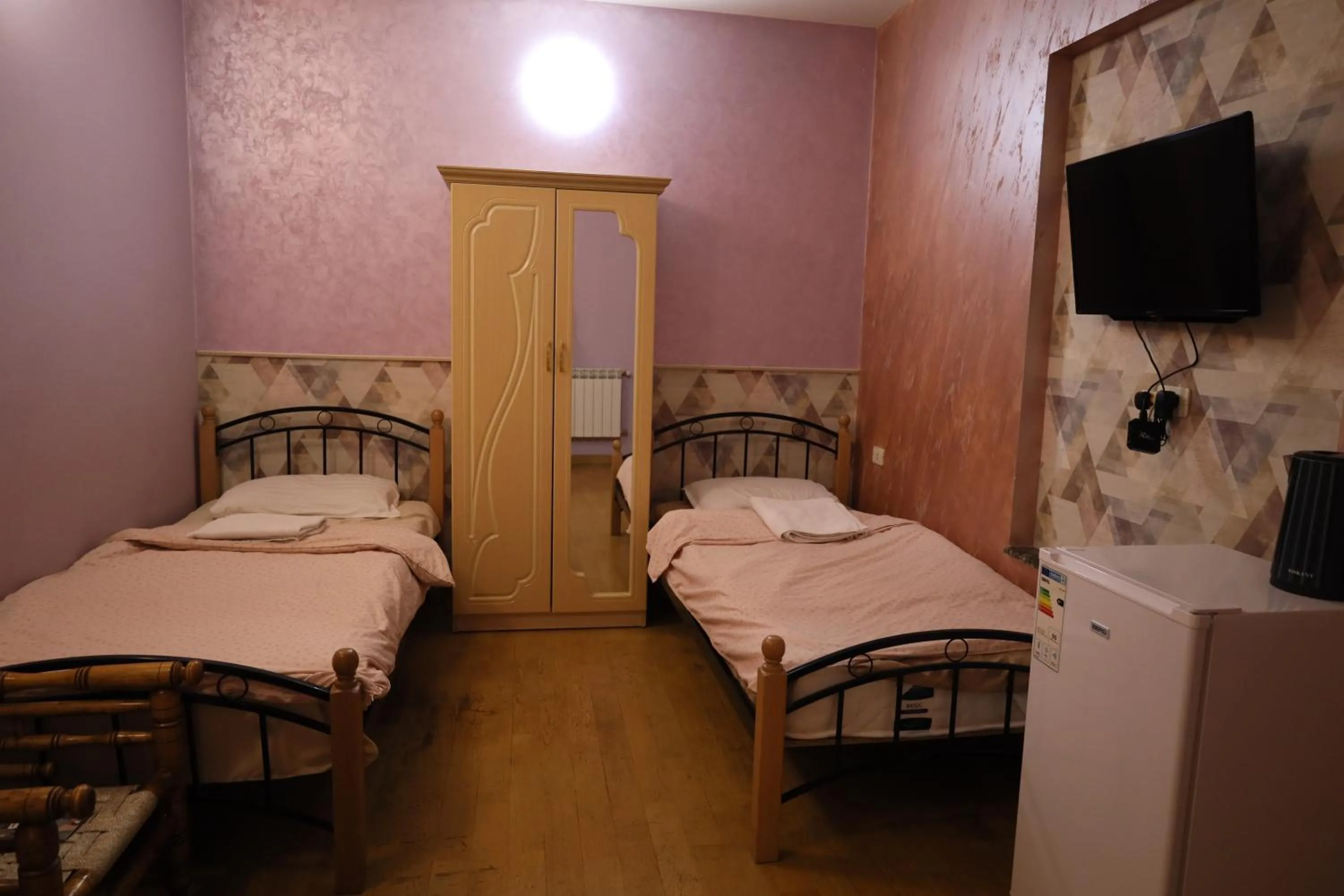 Bed in Art Hotel Yerevan