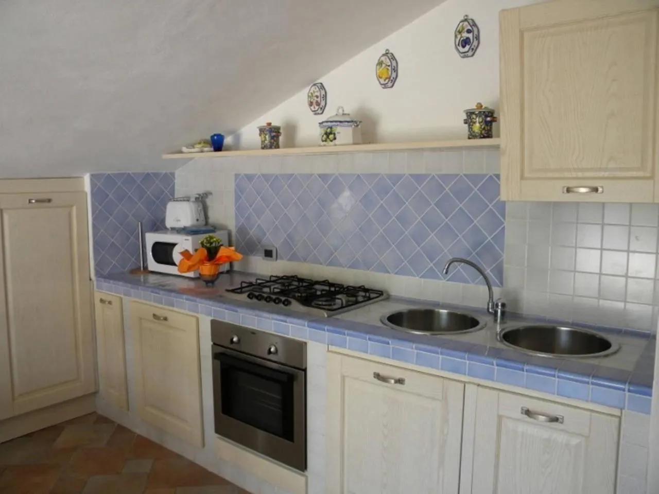 Kitchen or kitchenette in La Casa di Gigliola