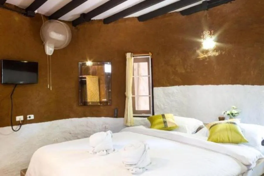 Bed in Hern Lhin Natural Resort