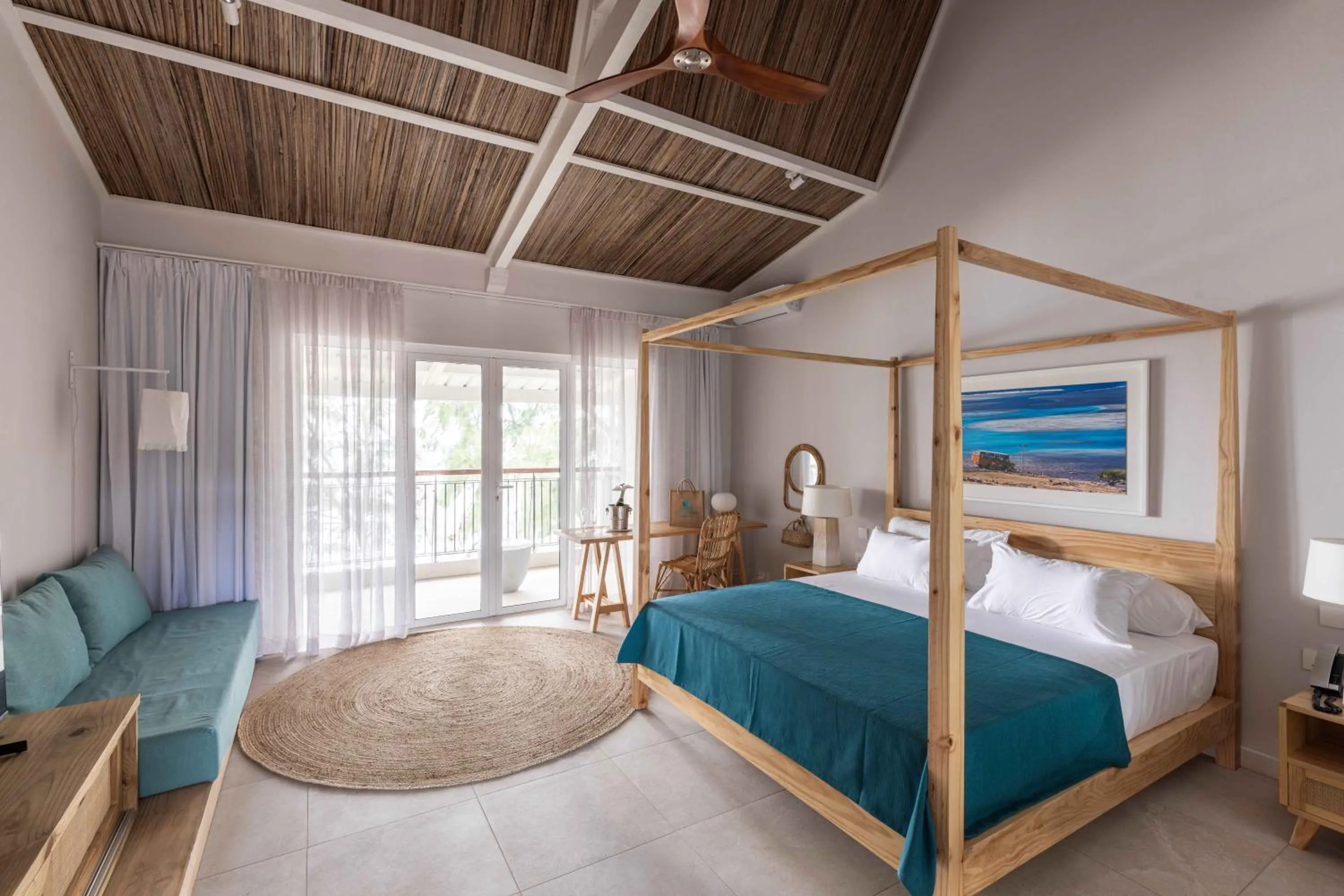 Balcony/Terrace, Bed in Cotton Bay Resort & Spa