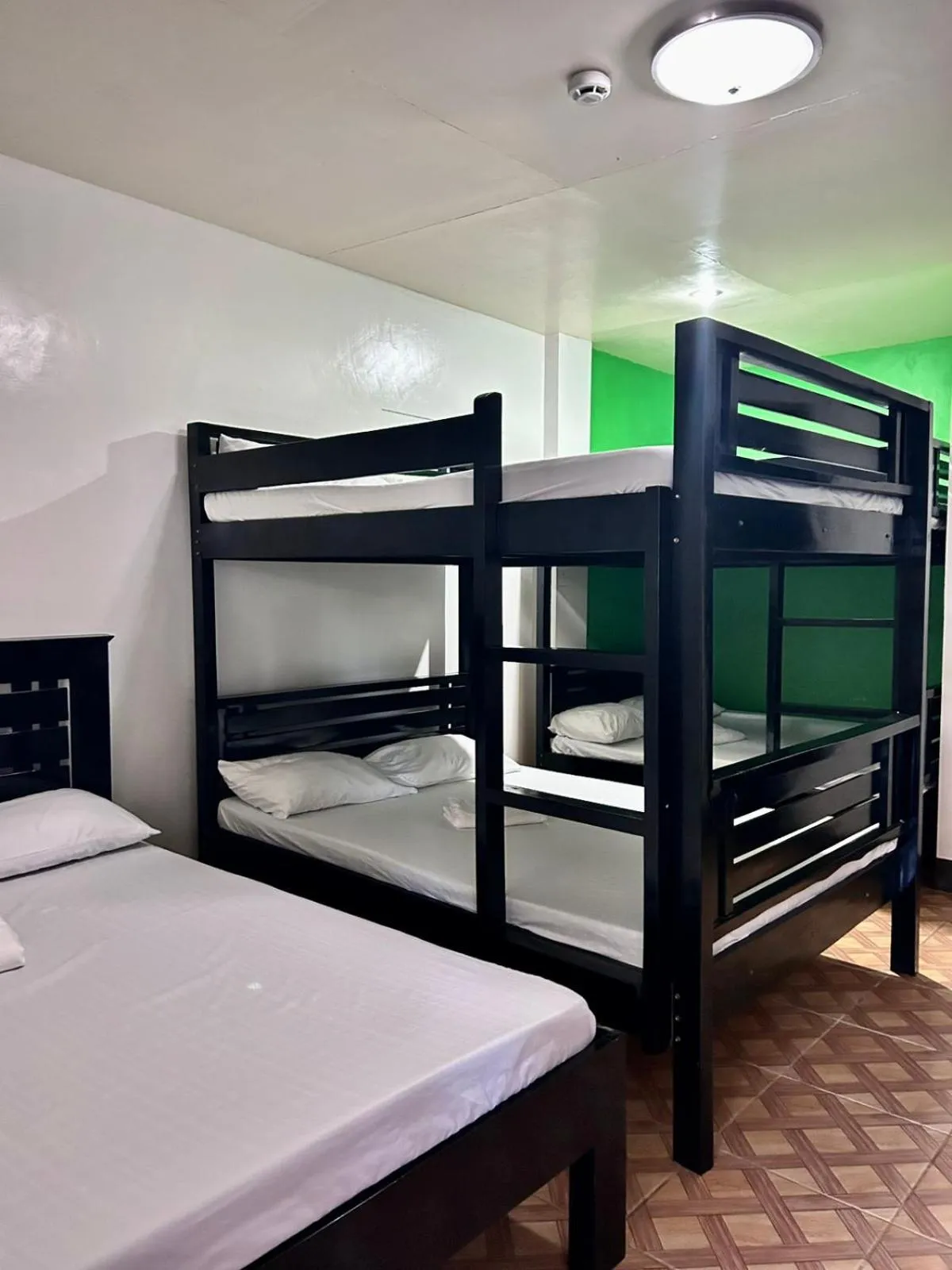 Bed in KNB West Villa Inn by SMS Hospitality