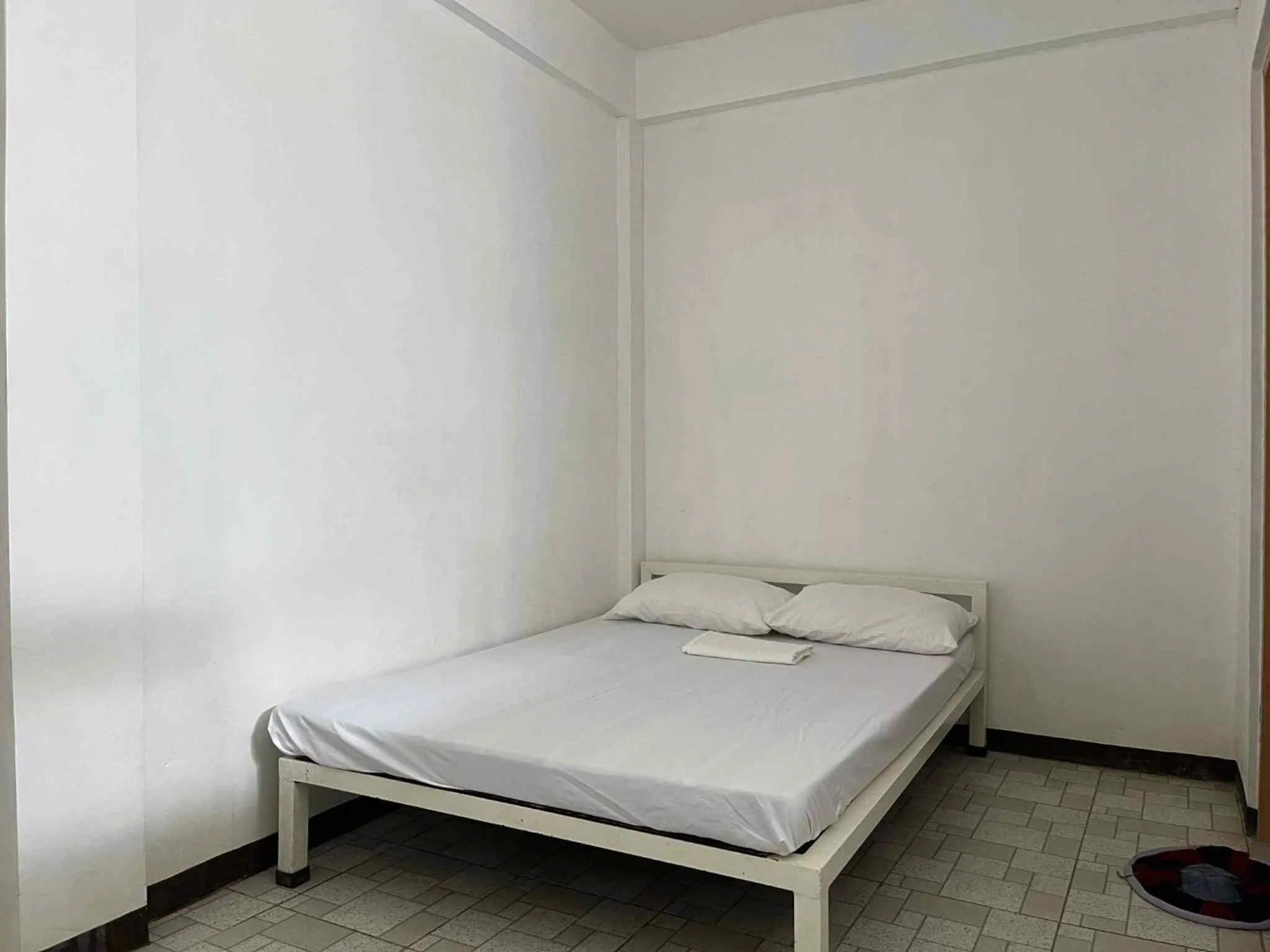 Bed in KNB West Villa Inn by SMS Hospitality