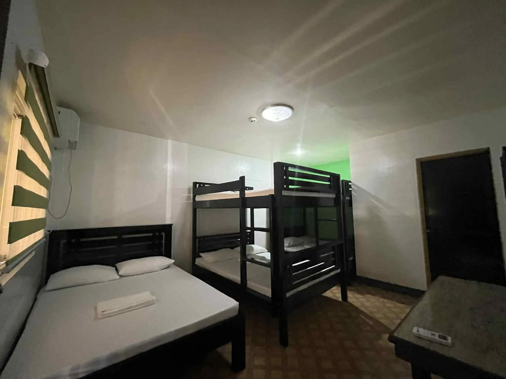 Bed in KNB West Villa Inn by SMS Hospitality