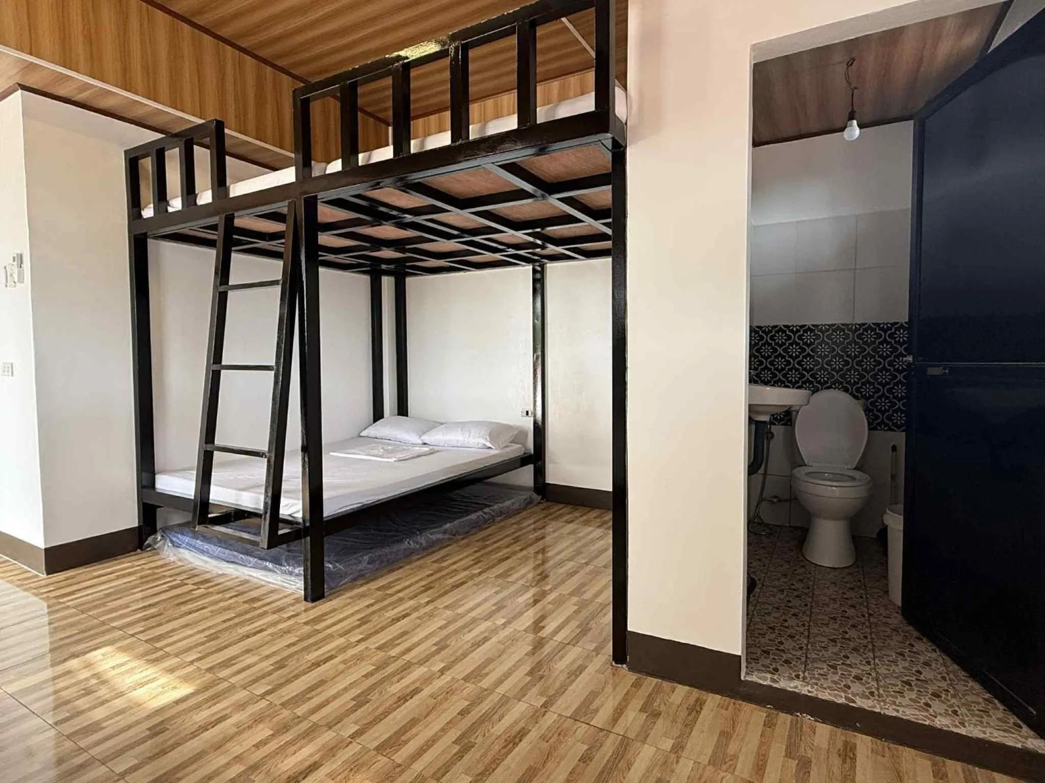 Bed in KNB West Villa Inn by SMS Hospitality