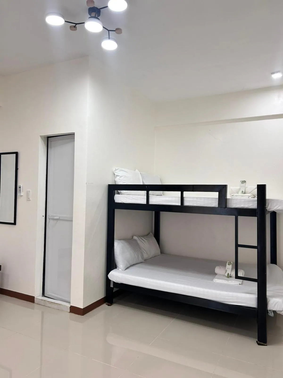 Bed in KNB West Villa Inn by SMS Hospitality
