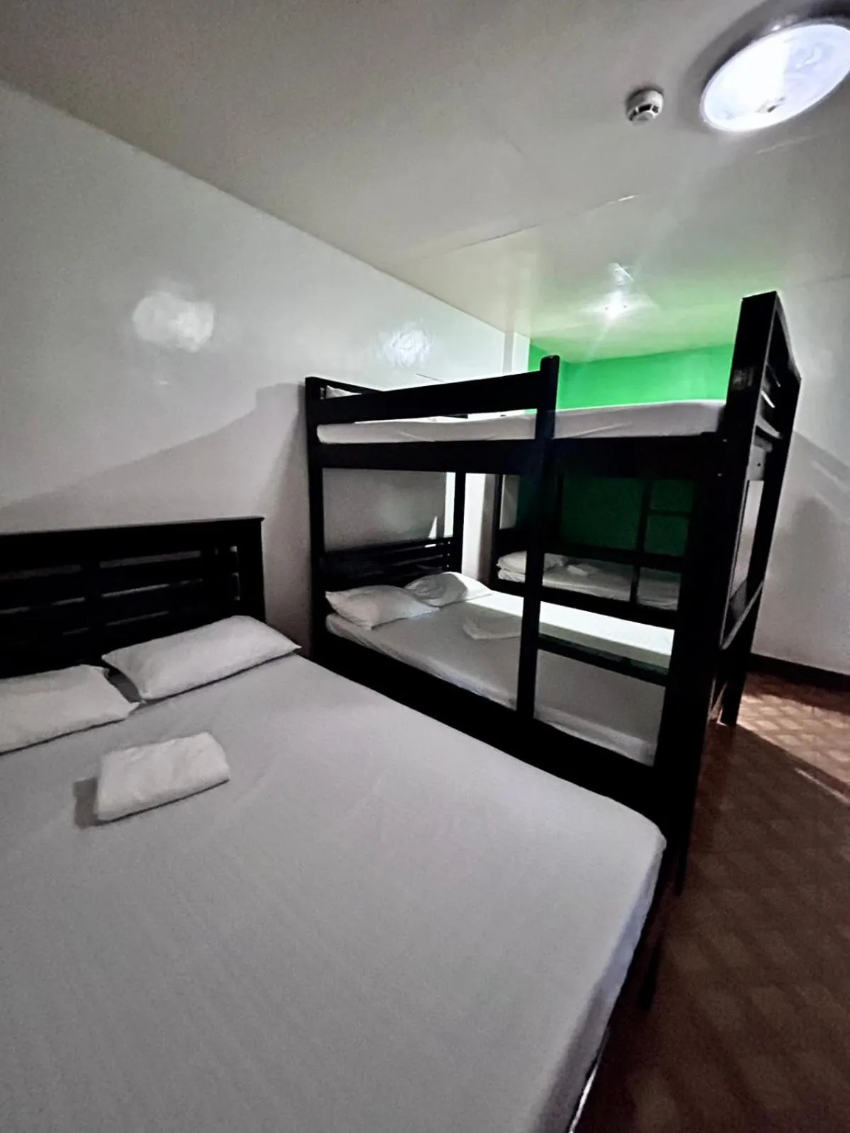 Bed in KNB West Villa Inn by SMS Hospitality