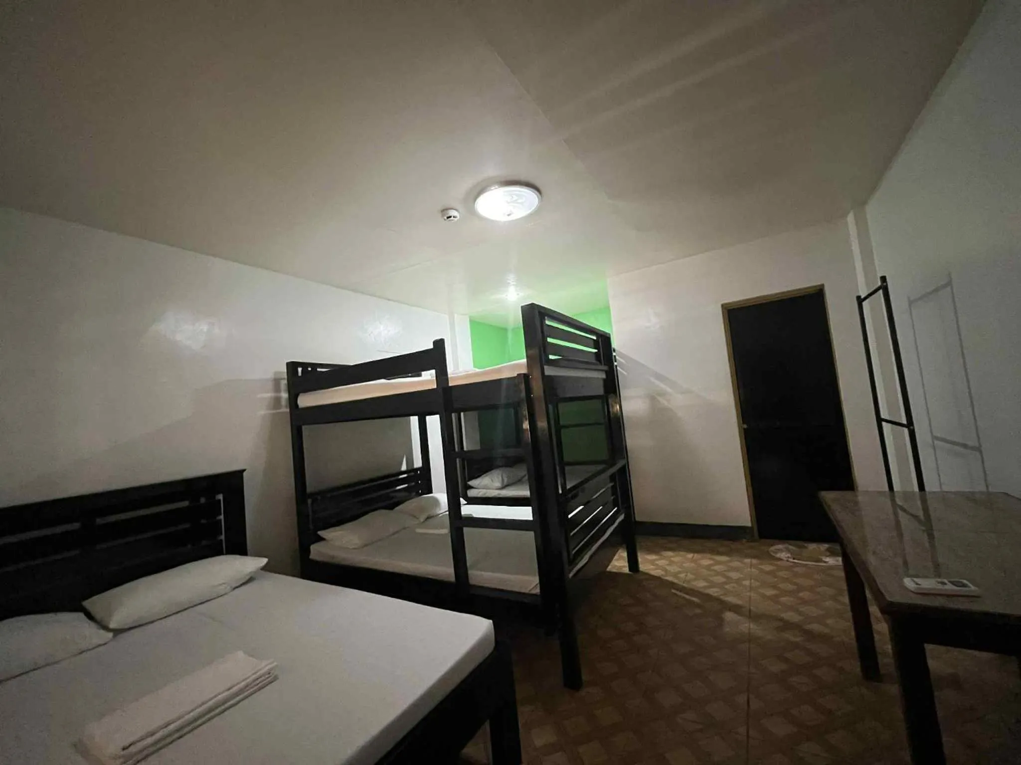 Bed in KNB West Villa Inn by SMS Hospitality