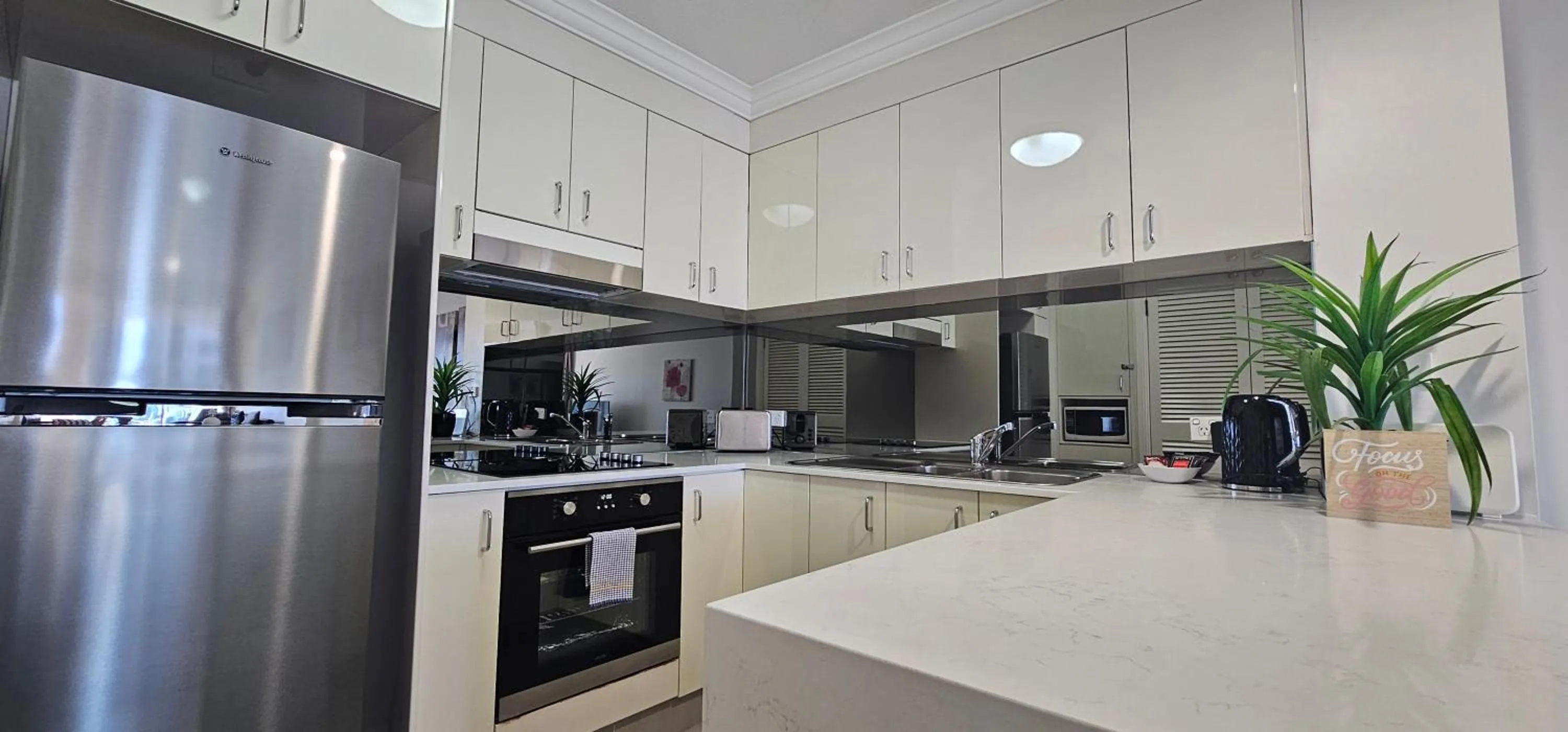 kitchen in Broadbeach Holiday Apartments