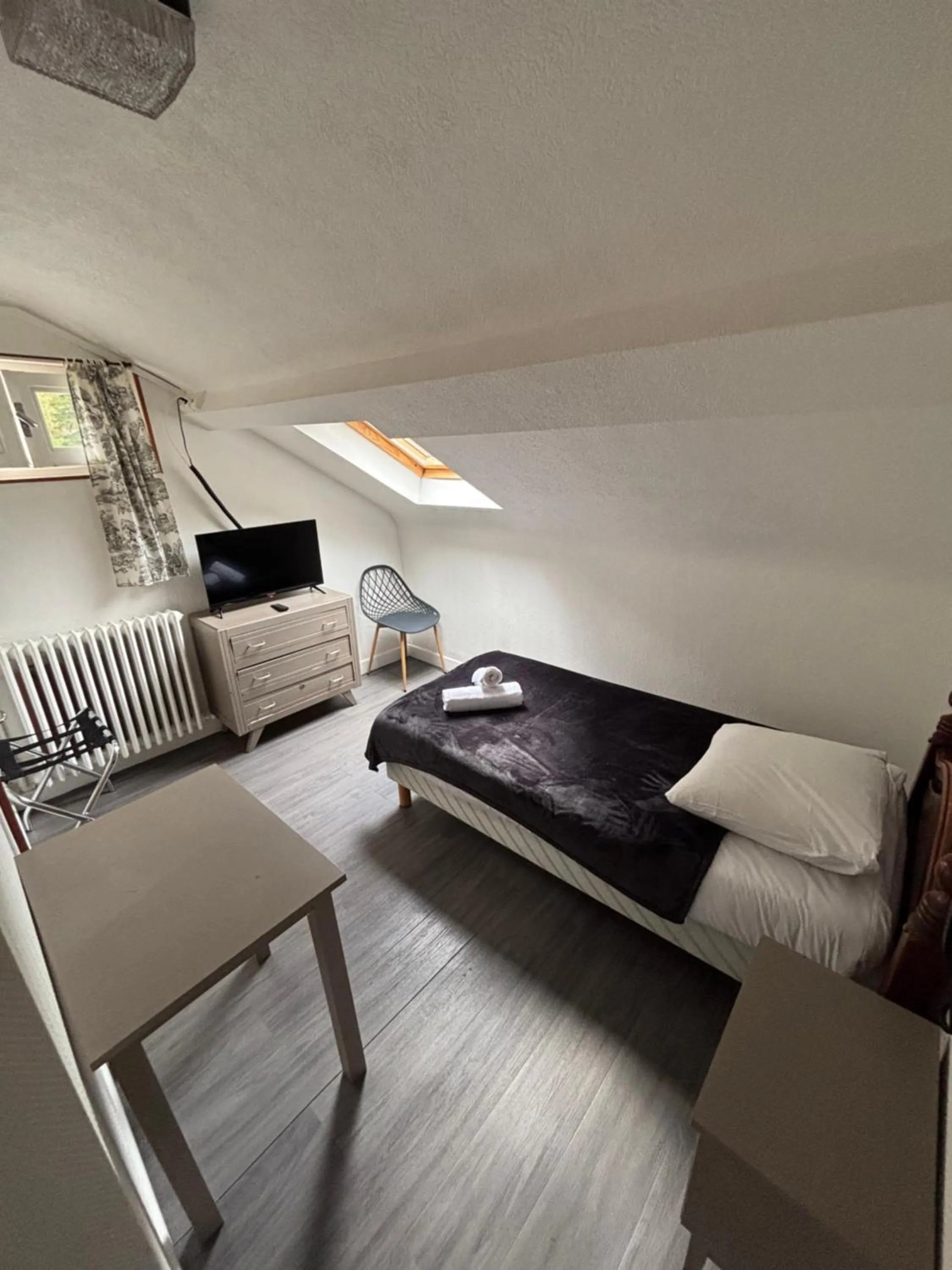 Bed in Hotel le Taillon