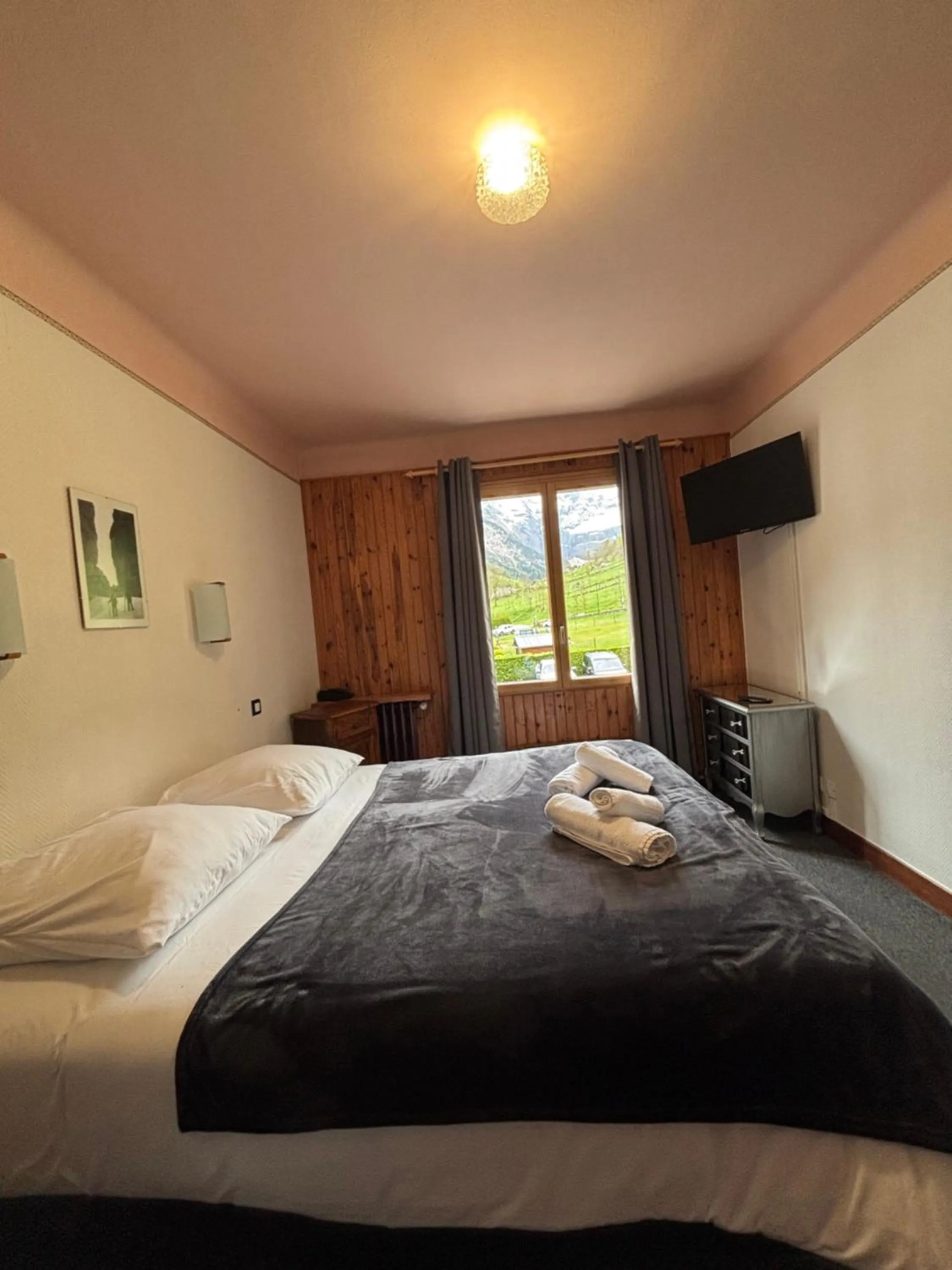 Bed in Hotel le Taillon