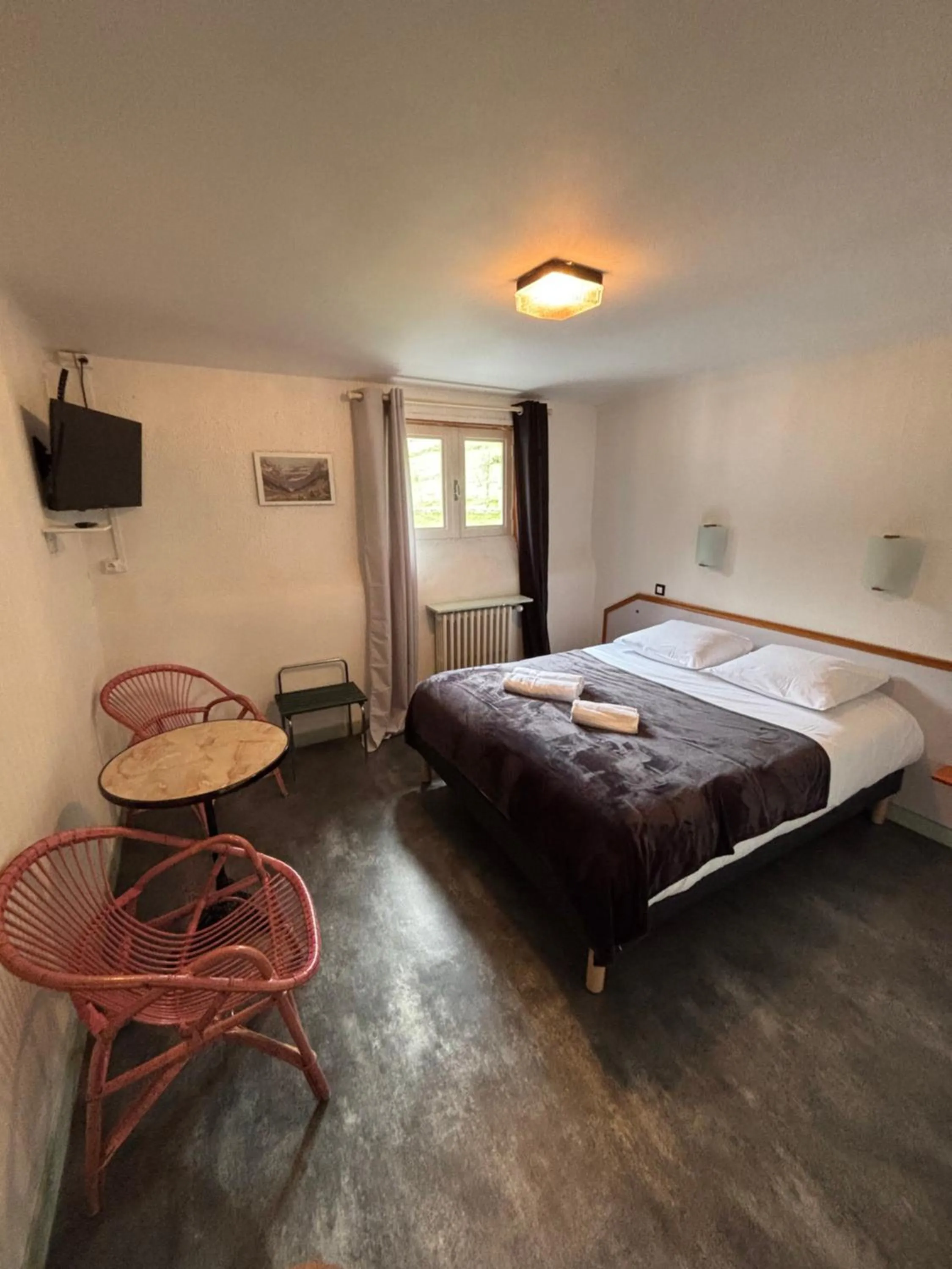 Bed in Hotel le Taillon