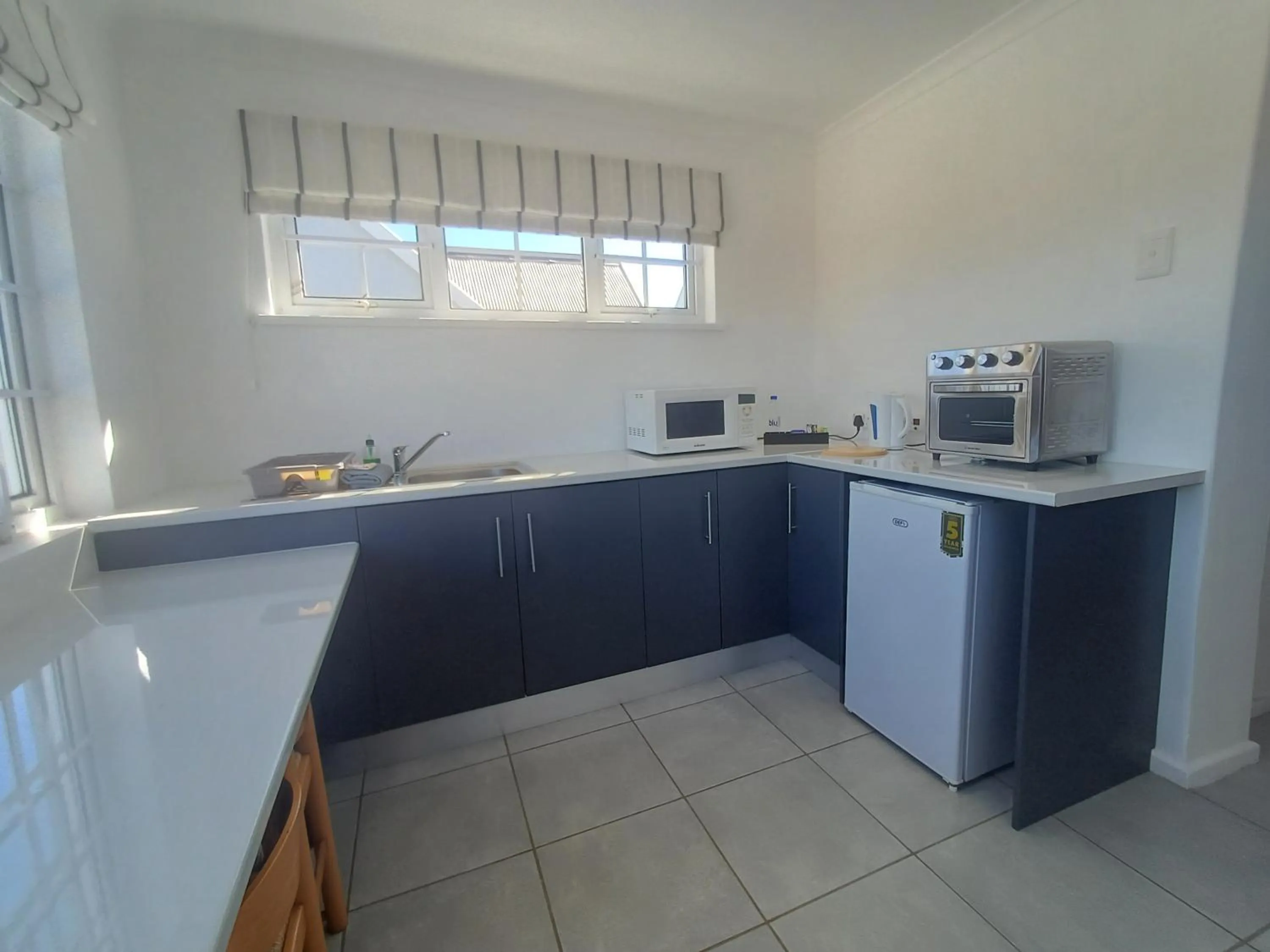 Kitchen or kitchenette in Millard Crescent Guest House