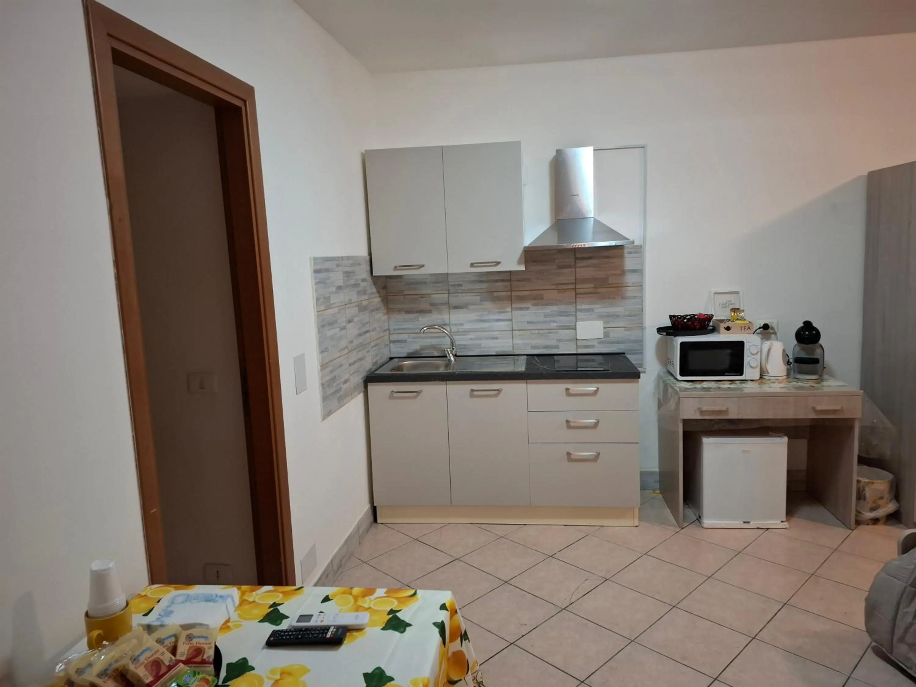 kitchen in Le Lumìe "Bed, Breakfast end Kitchen in the Room"