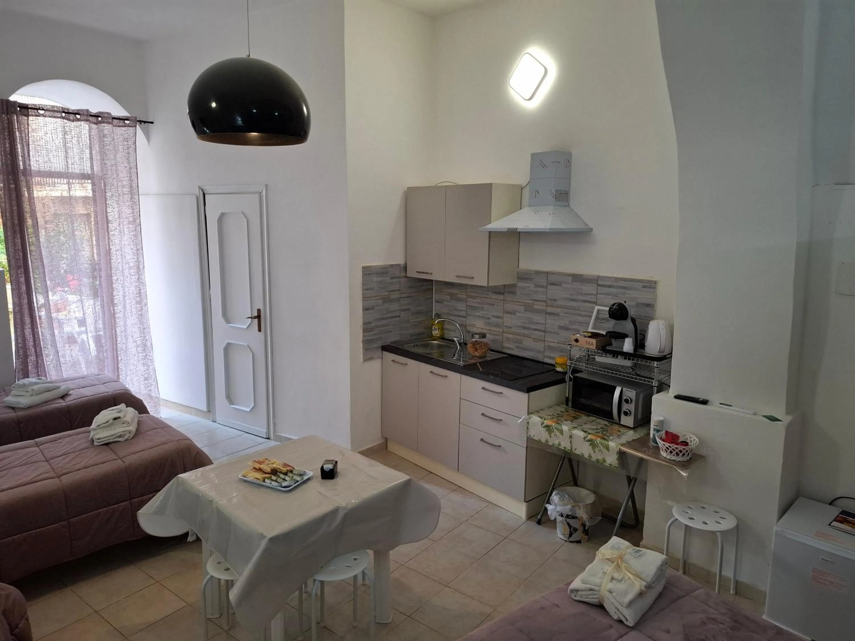 kitchen in Le Lumìe "Bed, Breakfast end Kitchen in the Room"