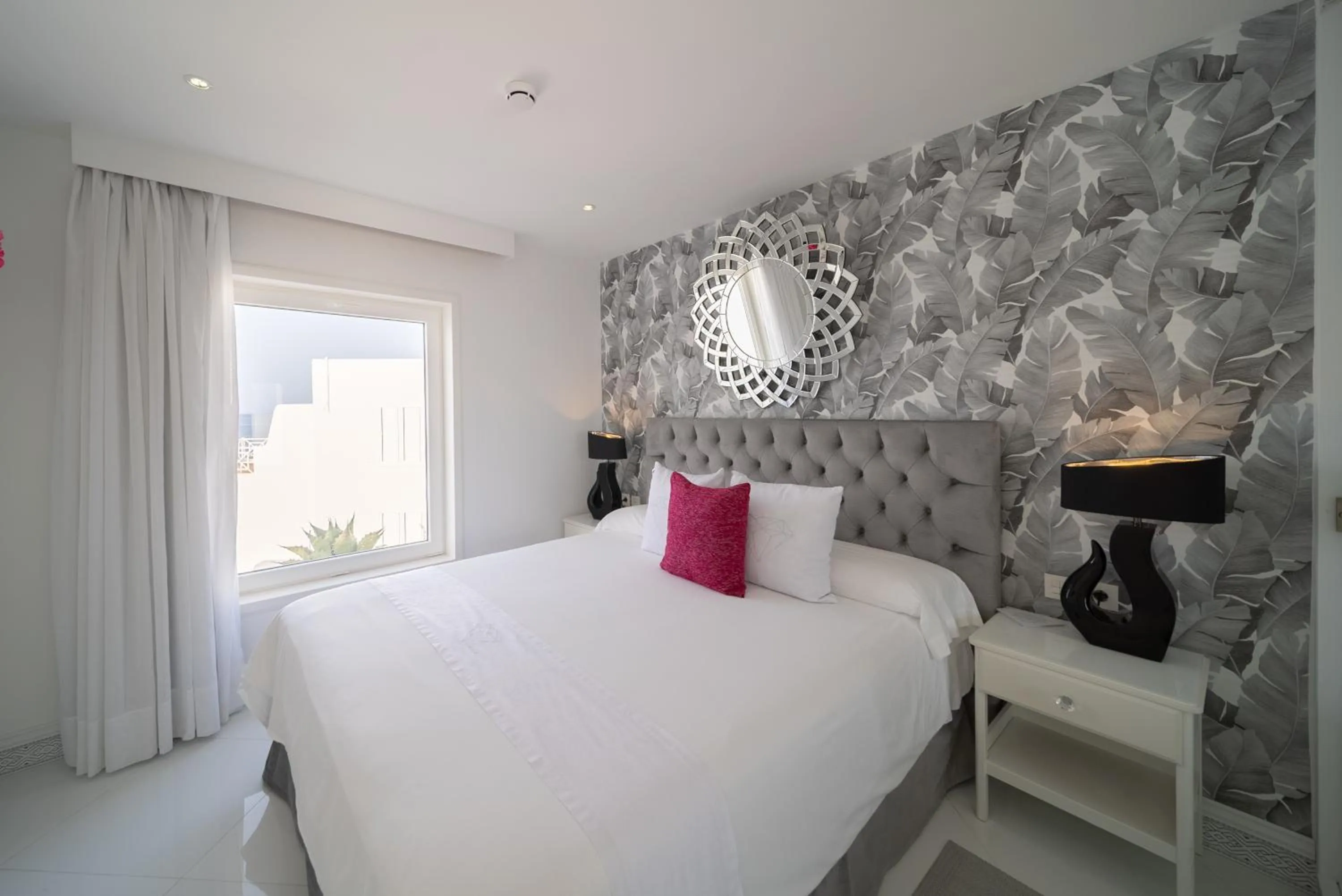 Bed in Lani's Suites de Luxe - Adults Only