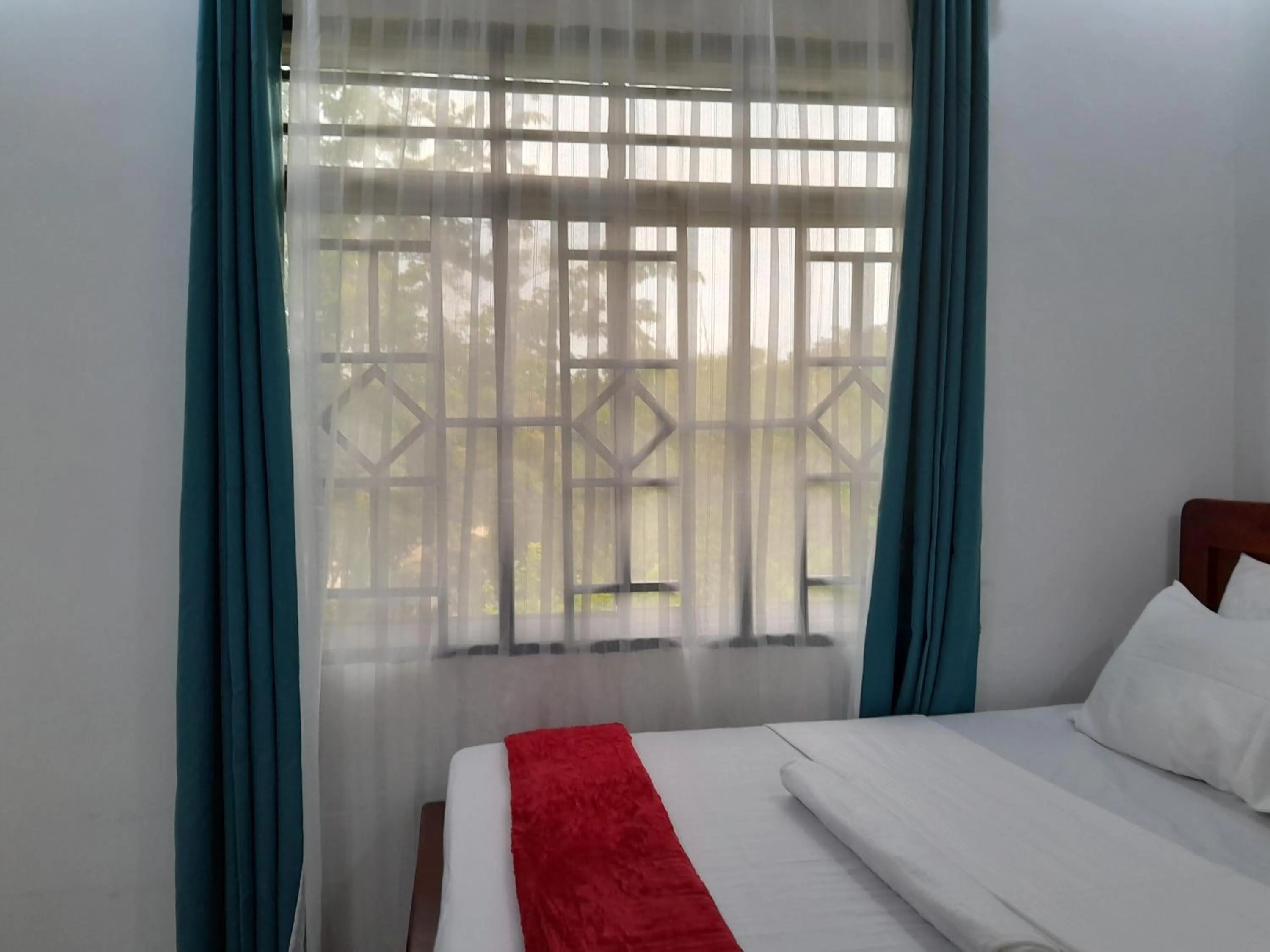 Bed in Valley Breeze Hotel