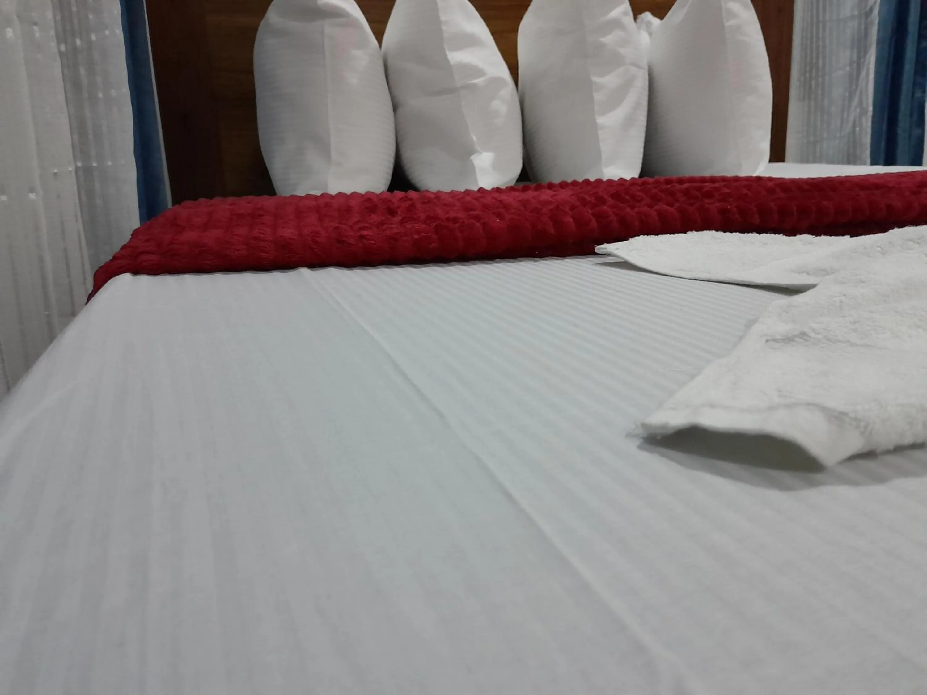 Bed in Valley Breeze Hotel