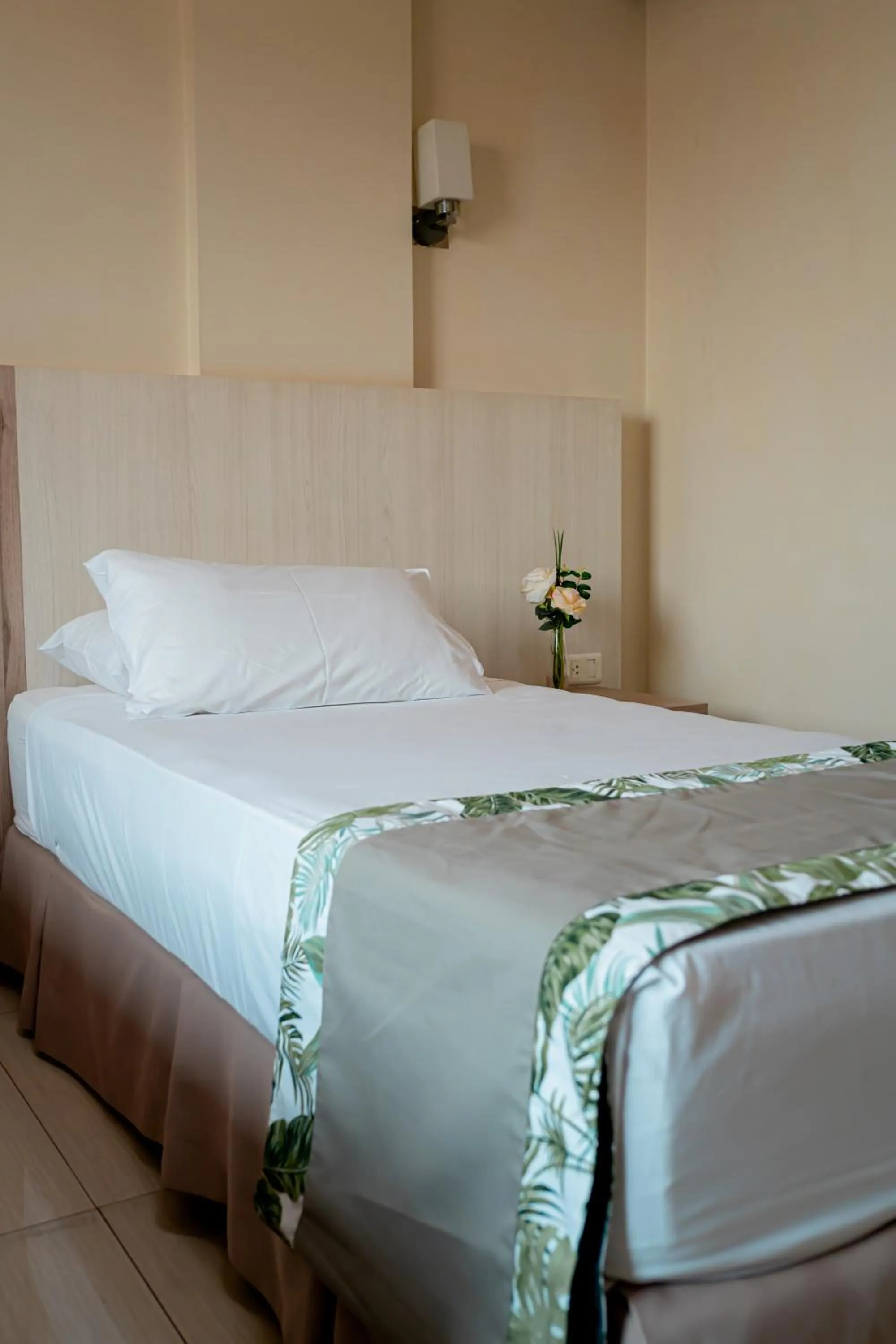 Bed in Megal Suites Hotel