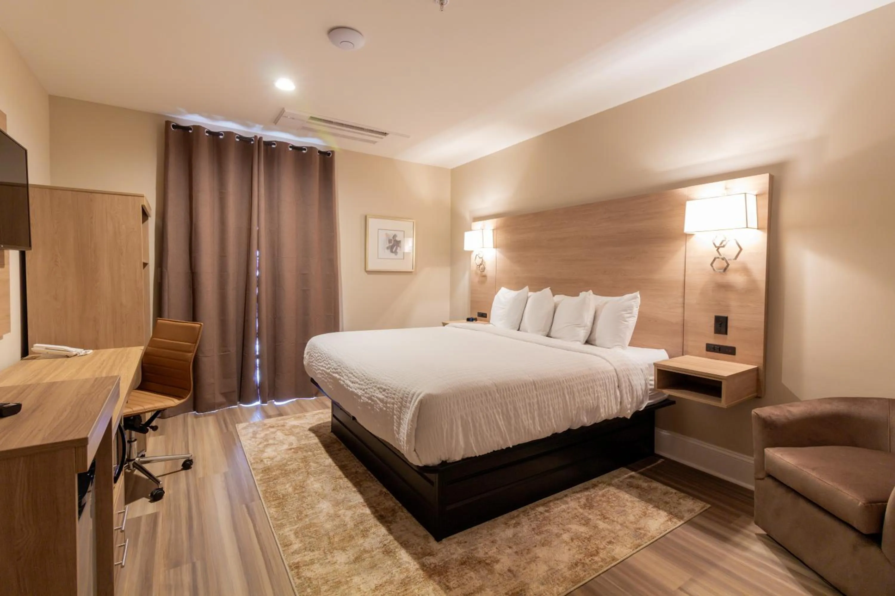 Bed in Bask Hotel at Big Rock Landing