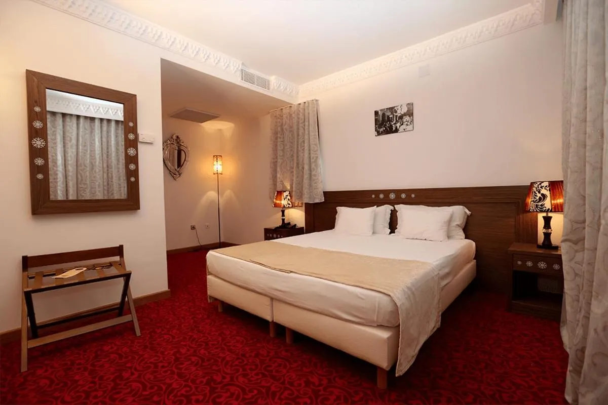 Bed in Le Caid Hotel