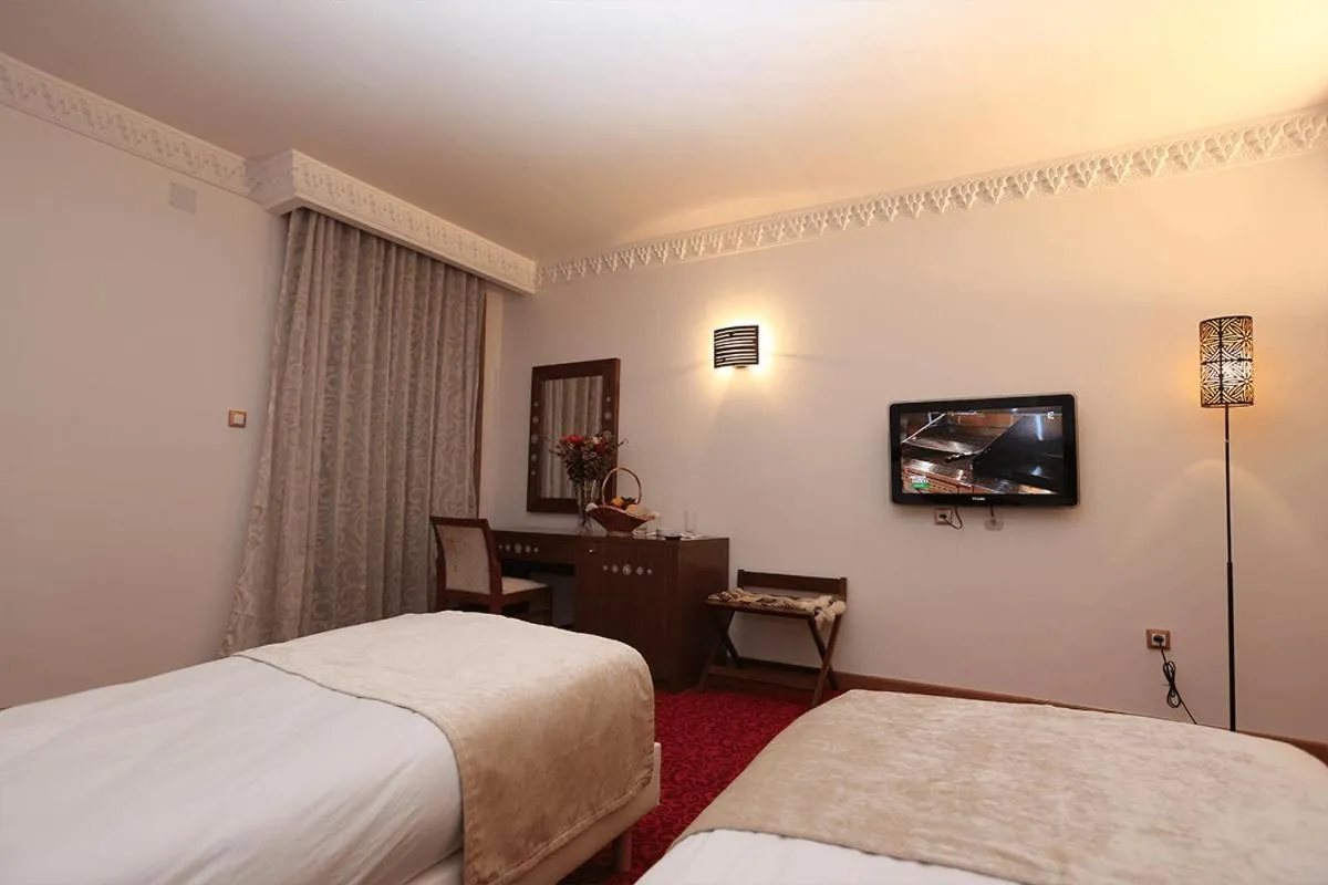 Bed in Le Caid Hotel