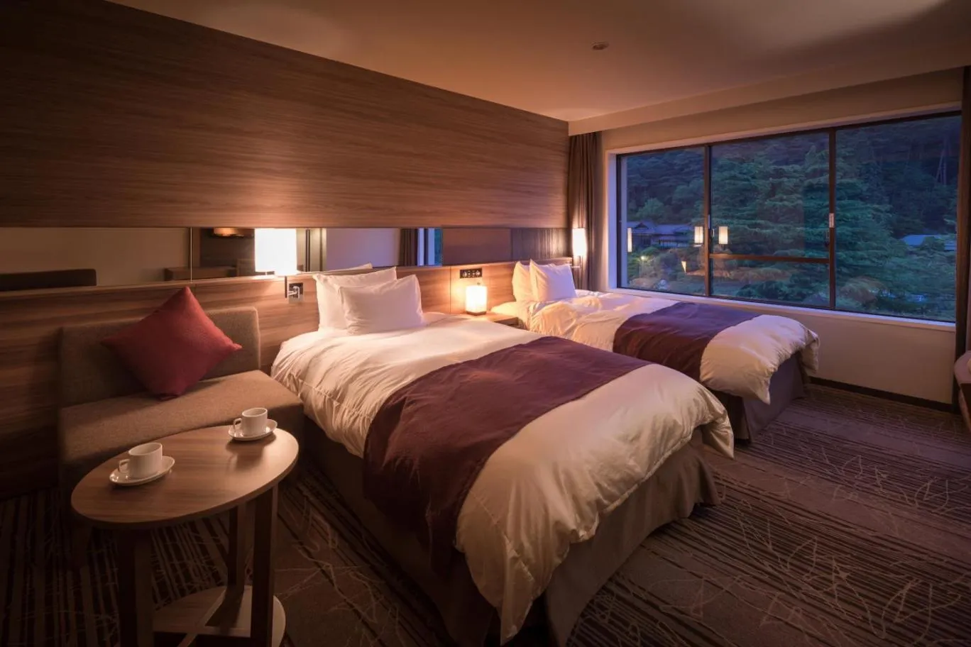 Photo of the whole room, Bed in Hotel Koyokan