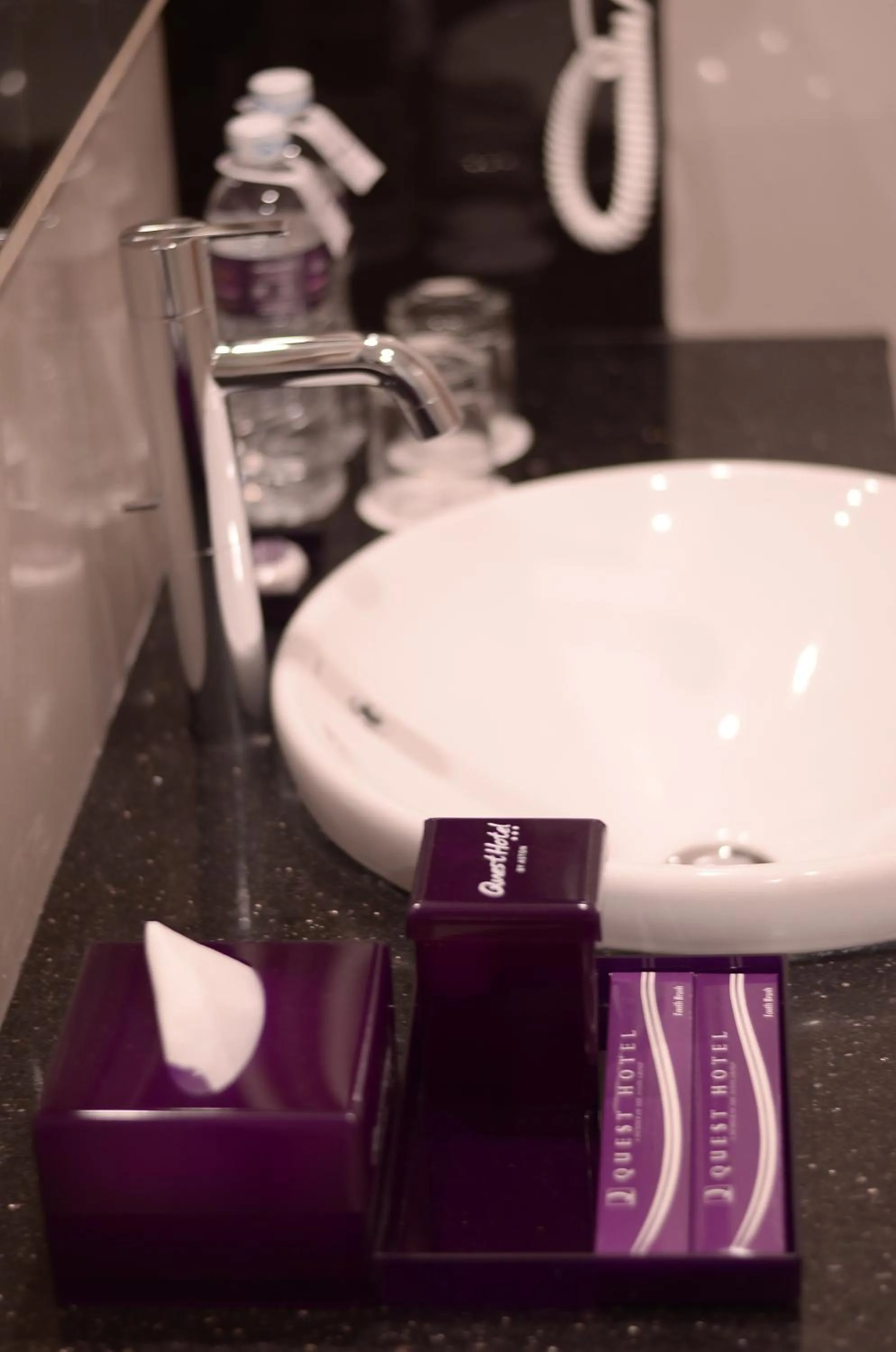 Bathroom in Quest San Denpasar by ASTON