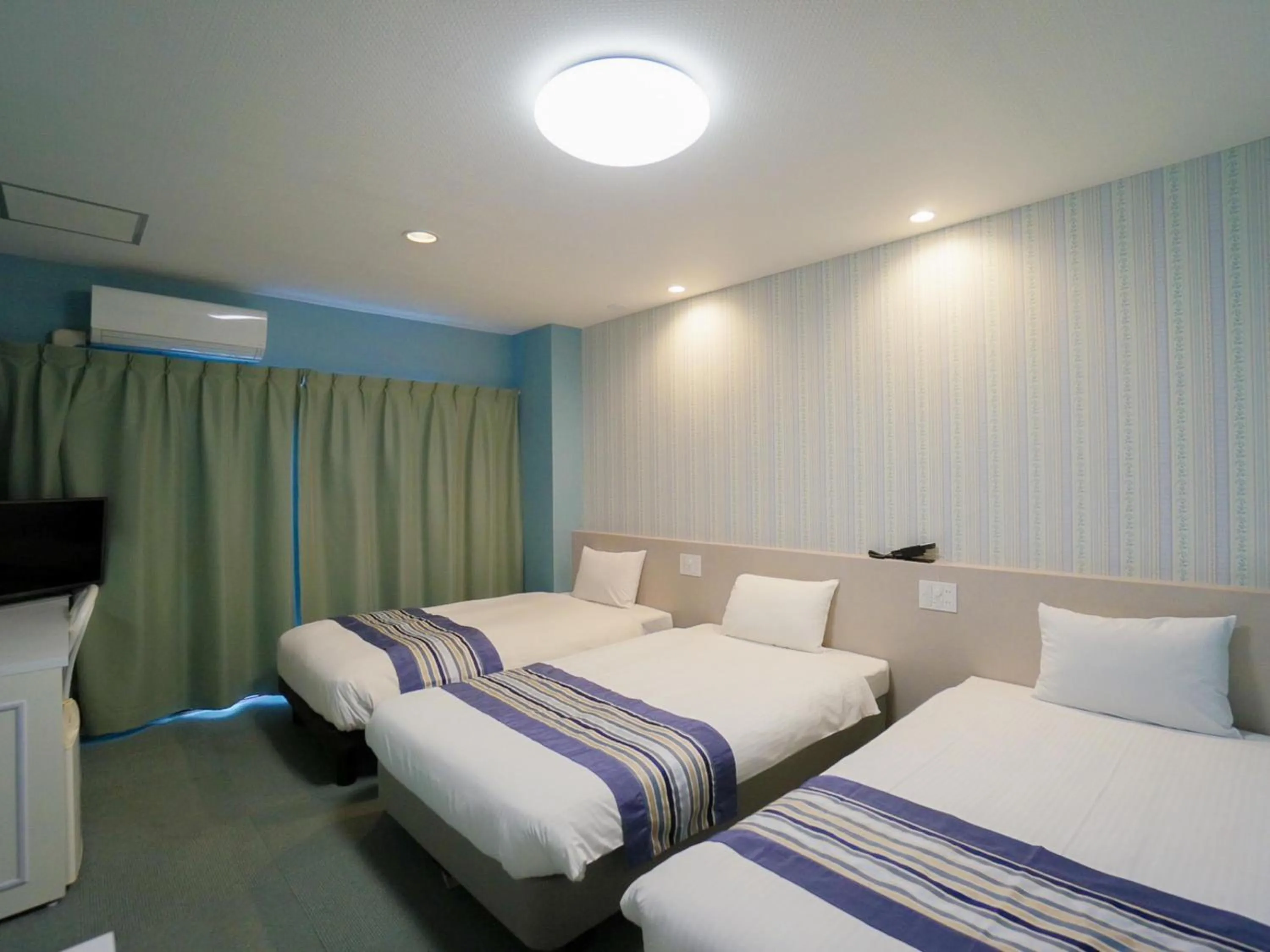 Bed in Hotel Caretta