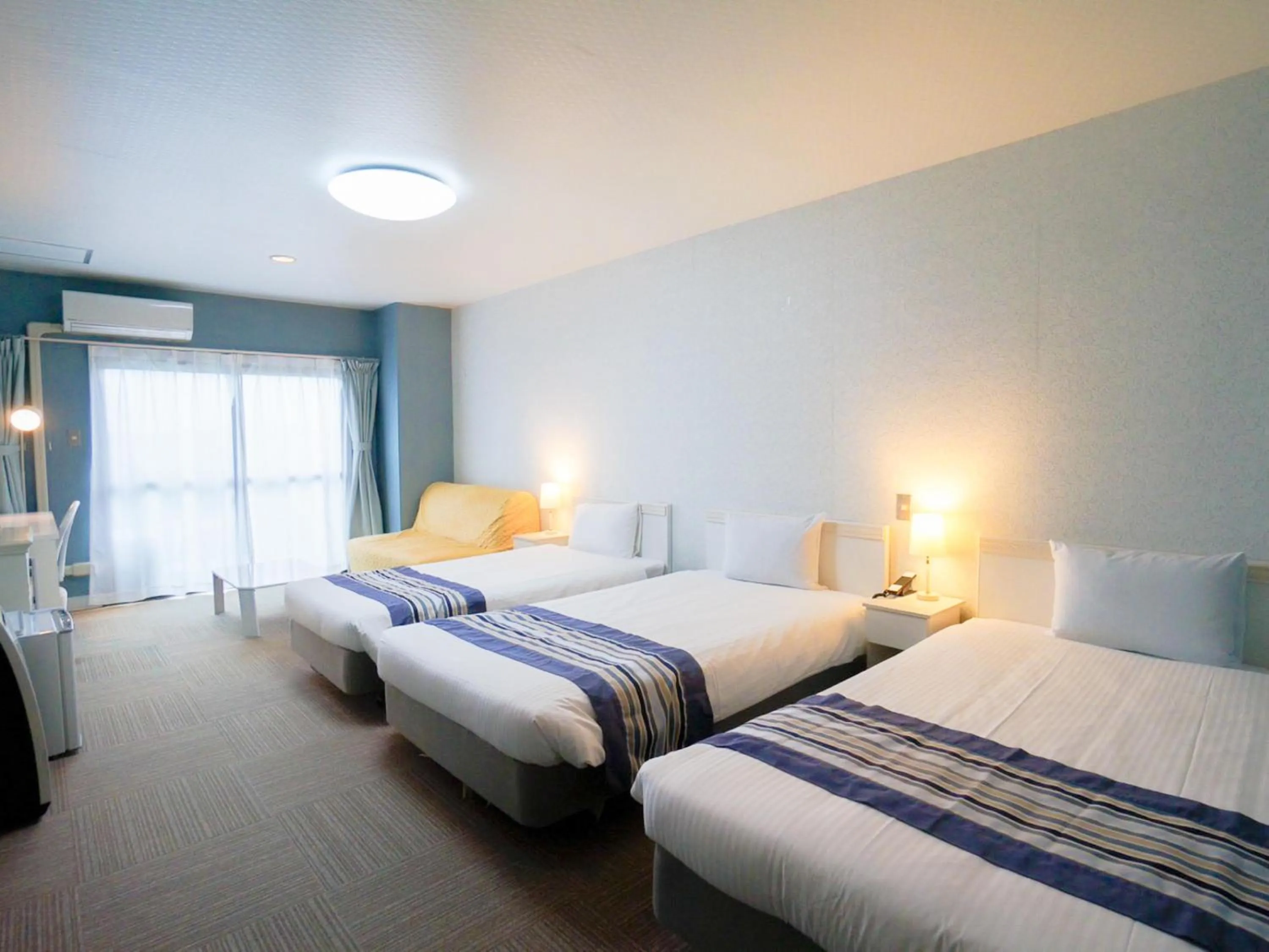 Bed in Hotel Caretta